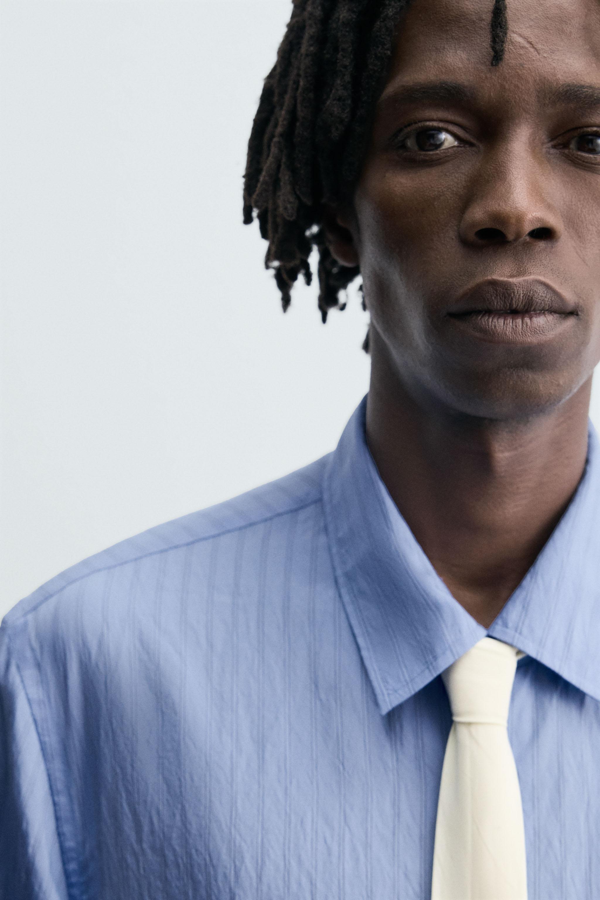 FLOWY SHIRT WITH WRINKLED STRIPE EFFECT