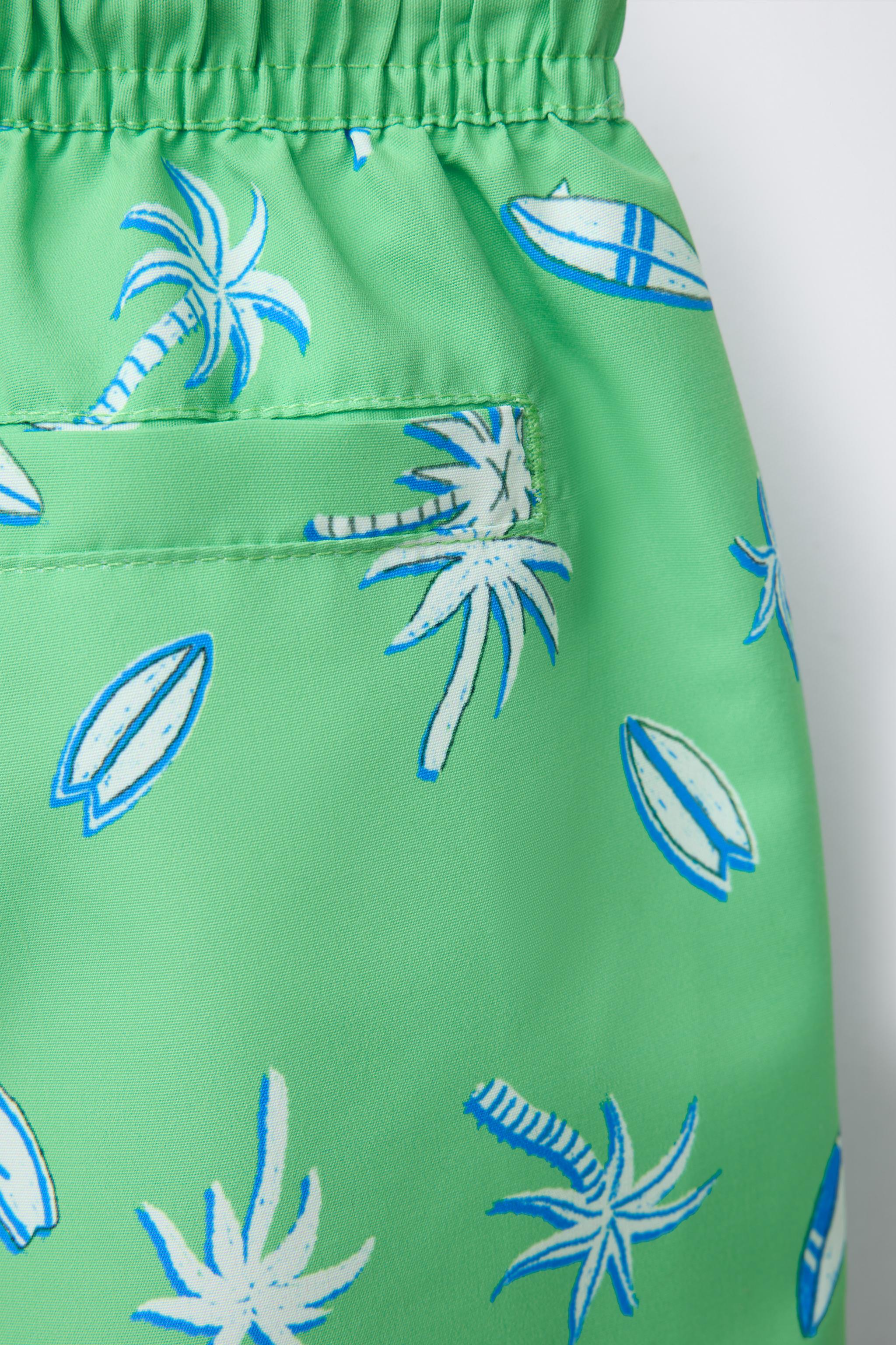 6-14 YEARS/ PALM TREE AND SURF SWIM SHORTS
