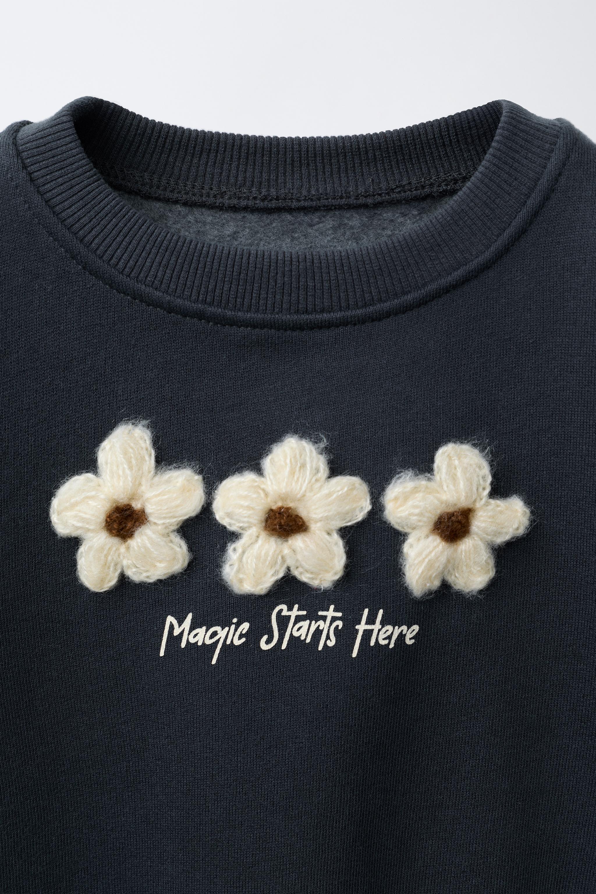 COMBINATION SWEATSHIRT WITH FLORAL APPLIQUÉ