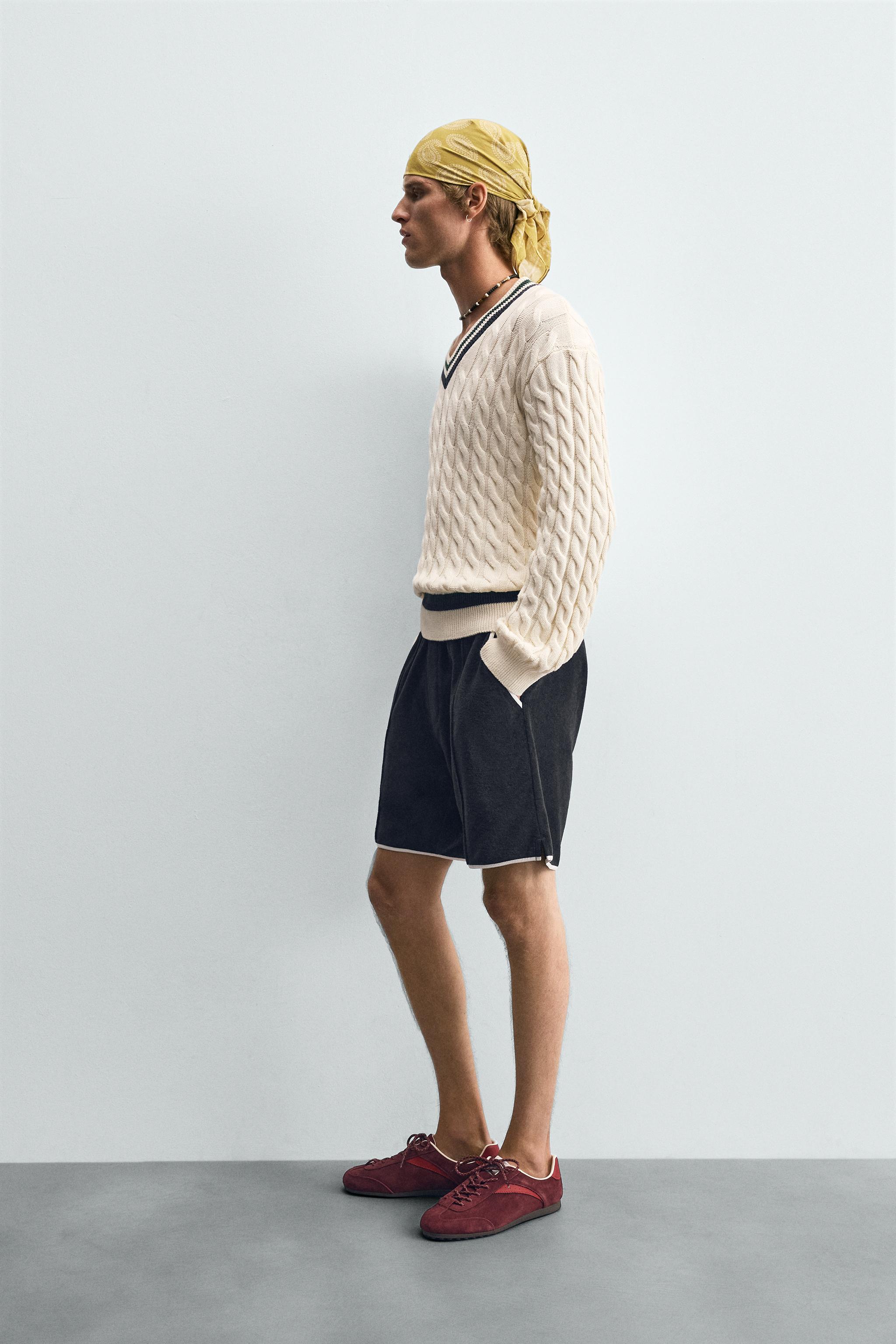CABLE KNIT SWEATER