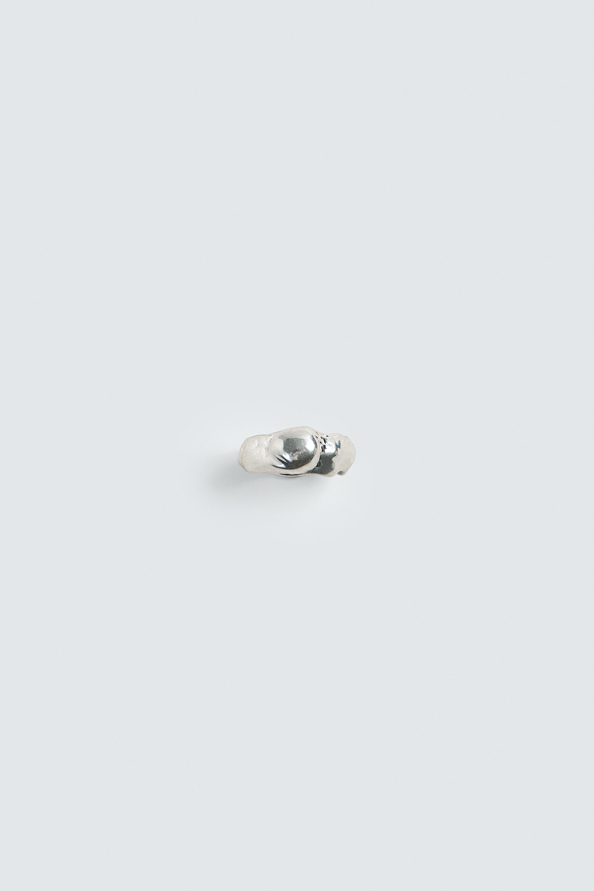 IRREGULAR METAL RING