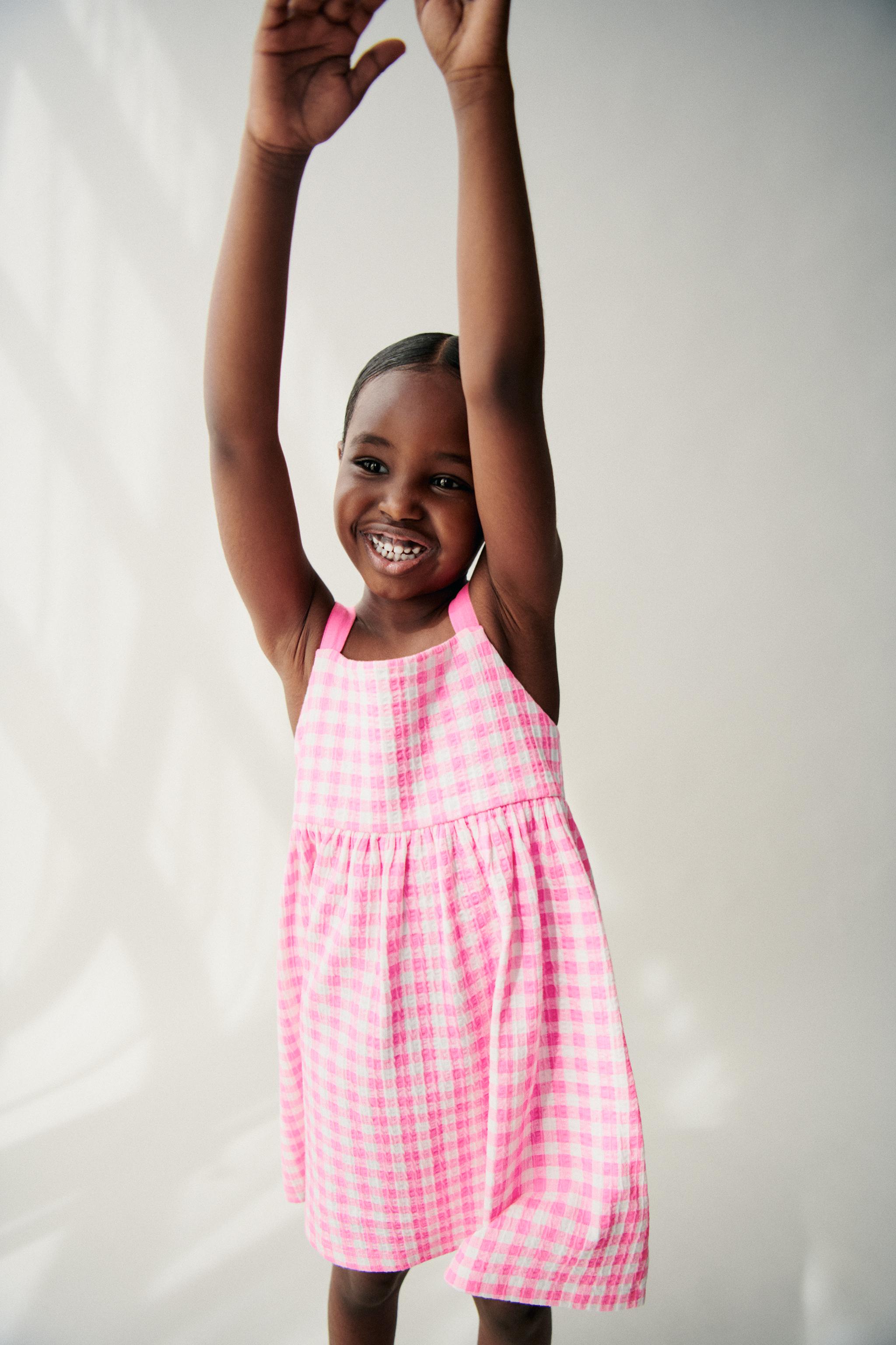 TEXTURED PRINTED BOW DRESS