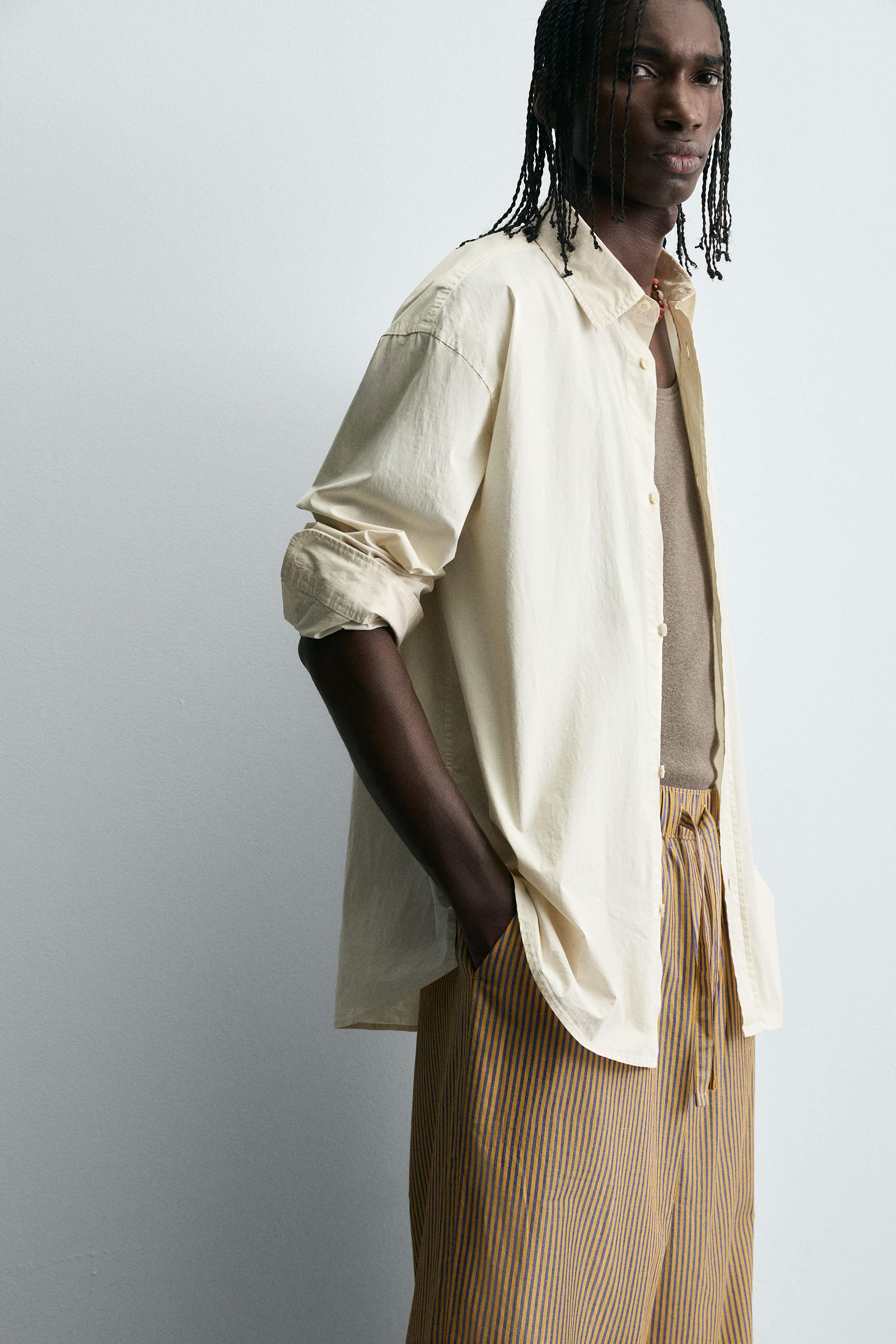 STRIPED OVERSIZED FIT PANTS