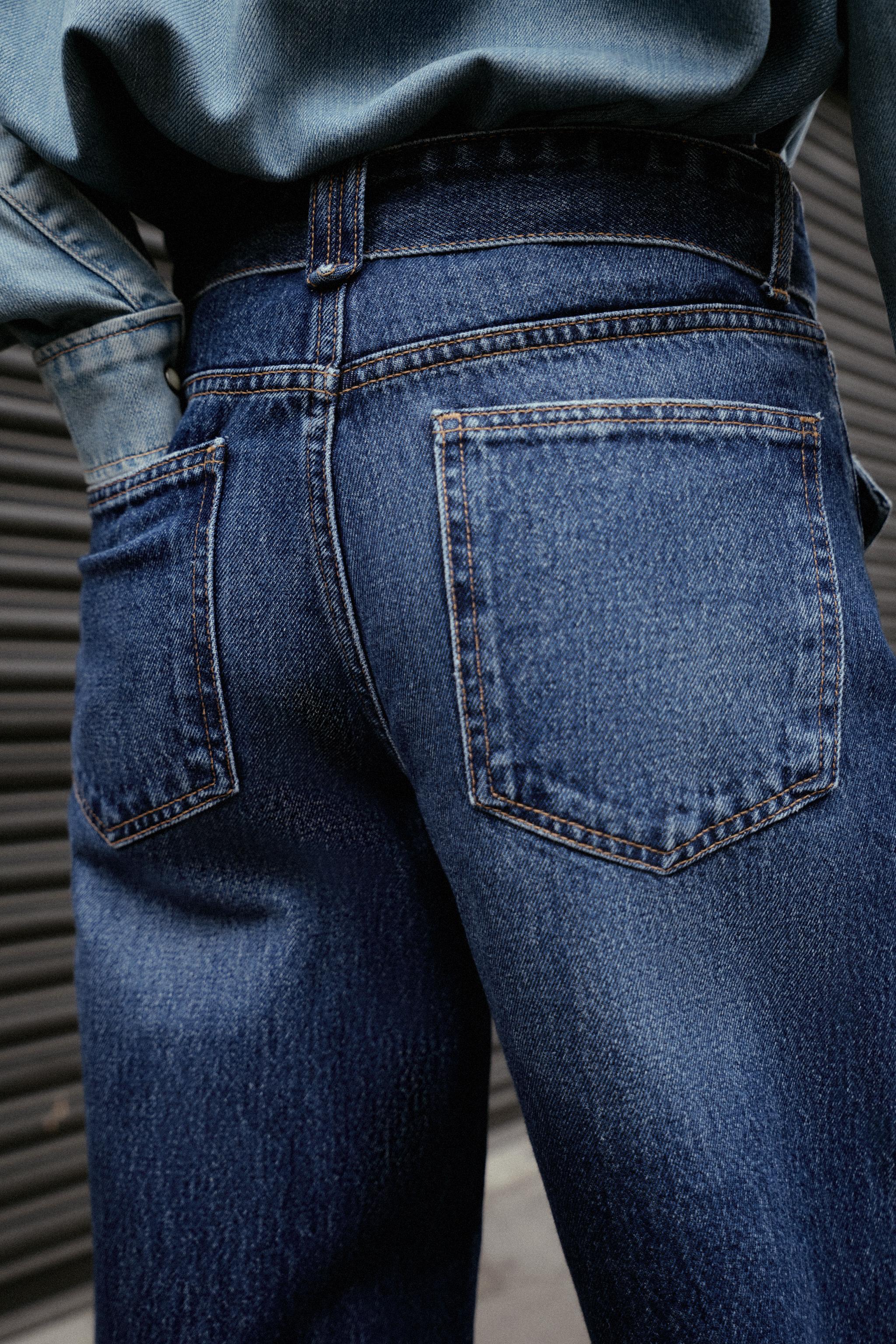 MID-RISE BELTED WIDE LEG JEANS