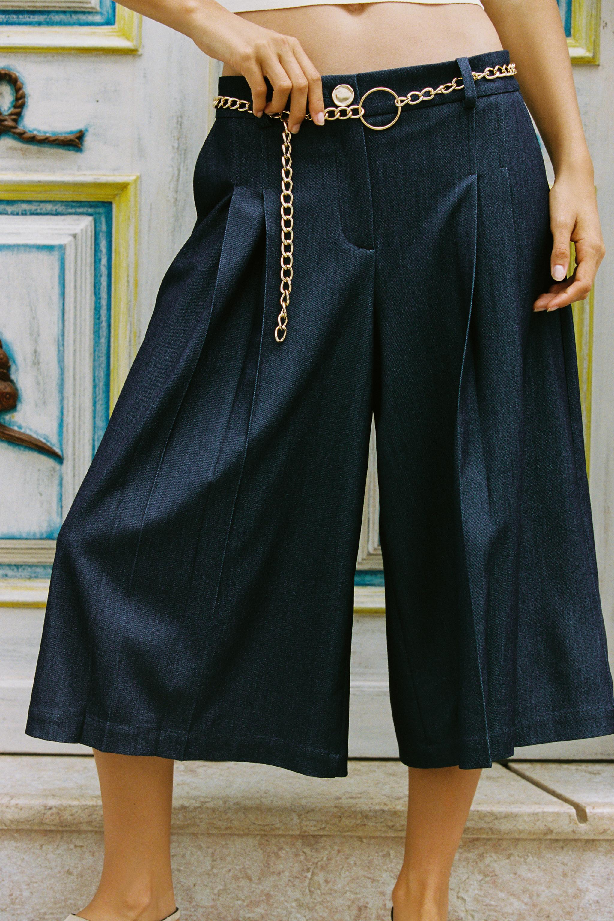 BELTED CHAIN LONG SHORTS