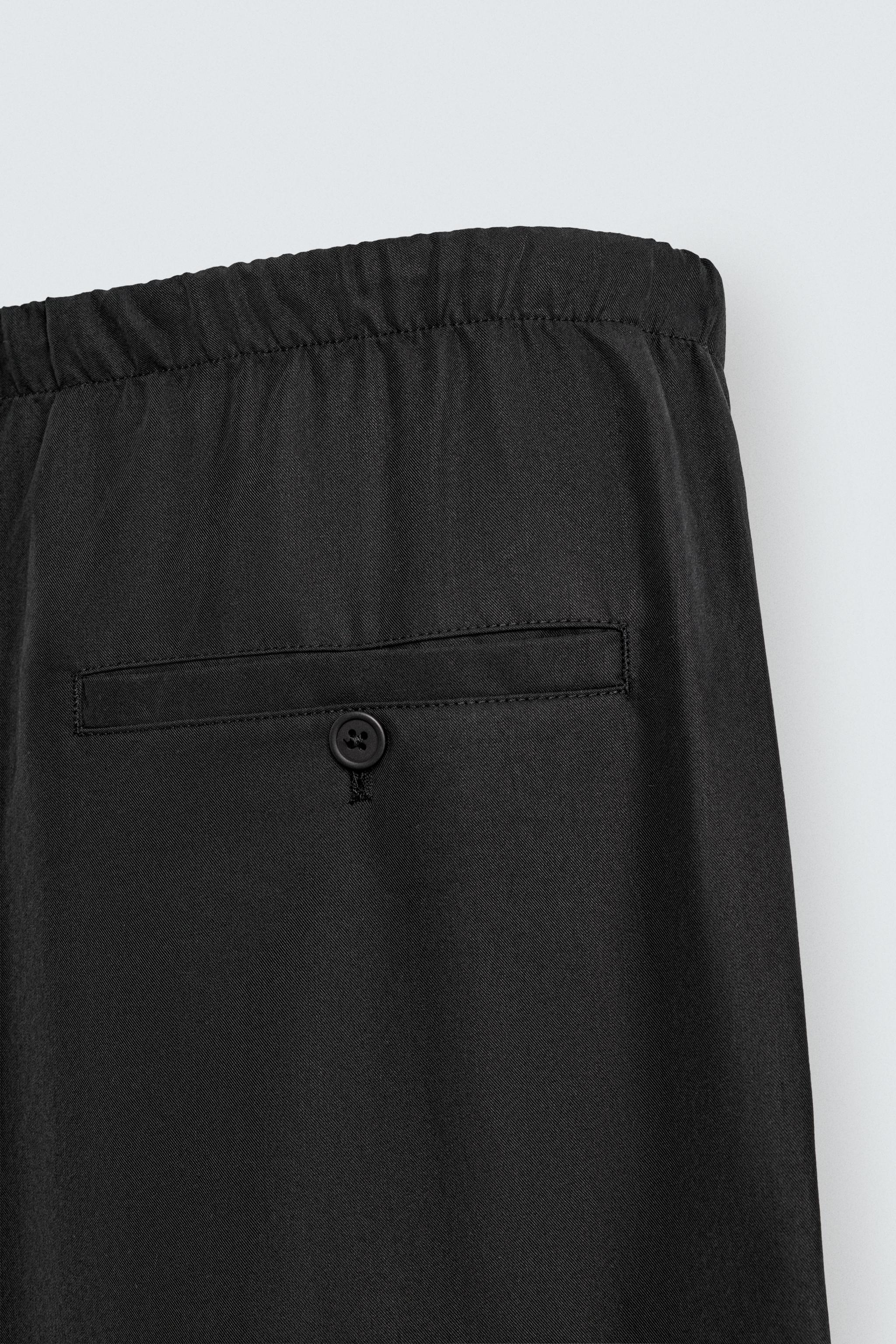 RELAXED FIT FLOWY PANTS