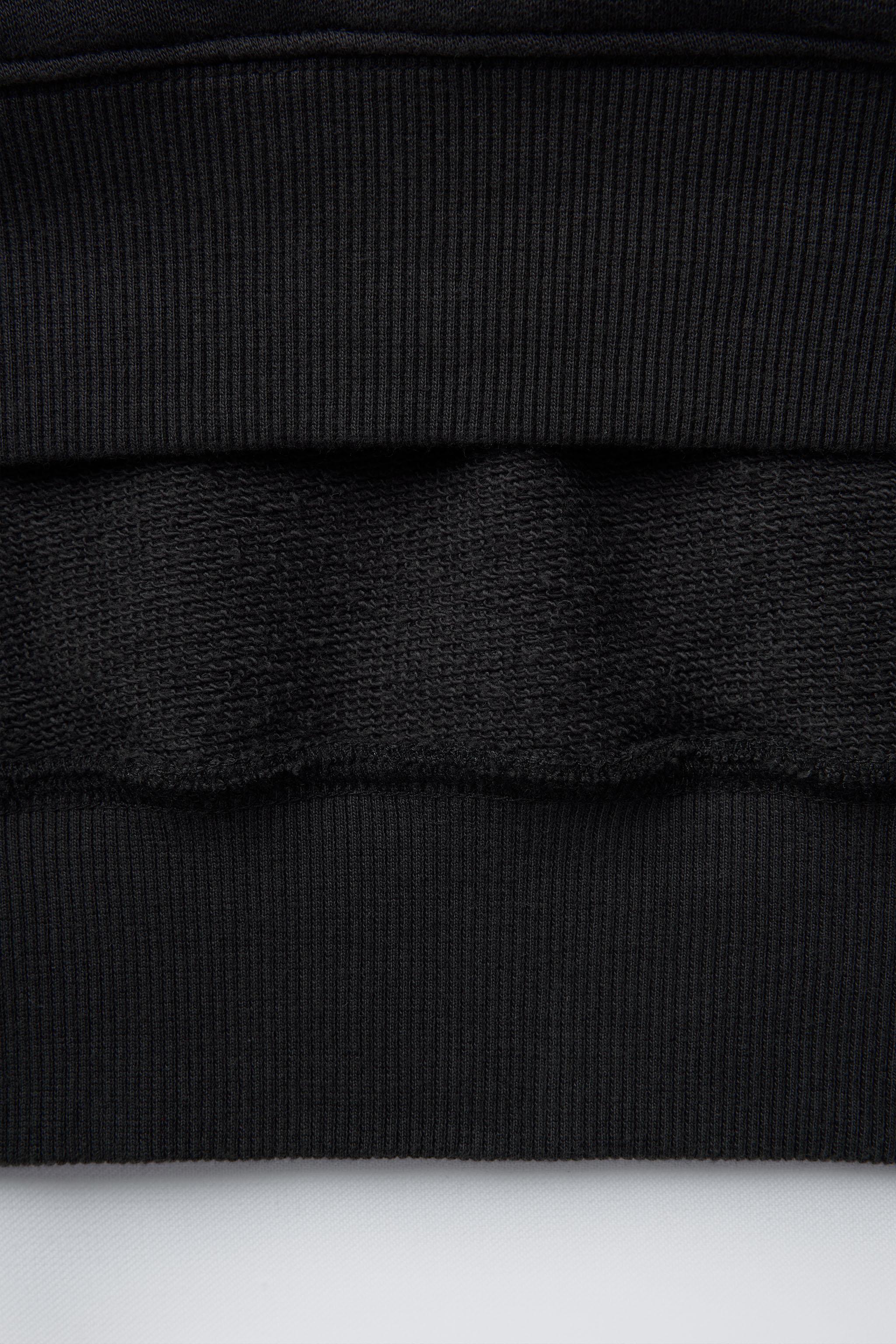 STAR WASHED EFFECT HOODED SWEATSHIRT