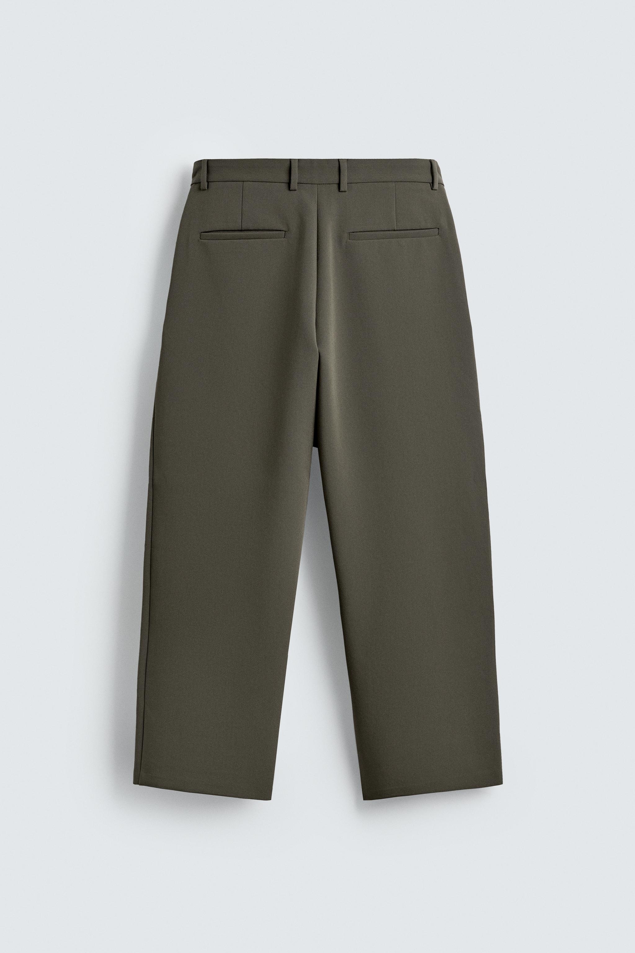 RELAXED FIT PLEATED PANTS