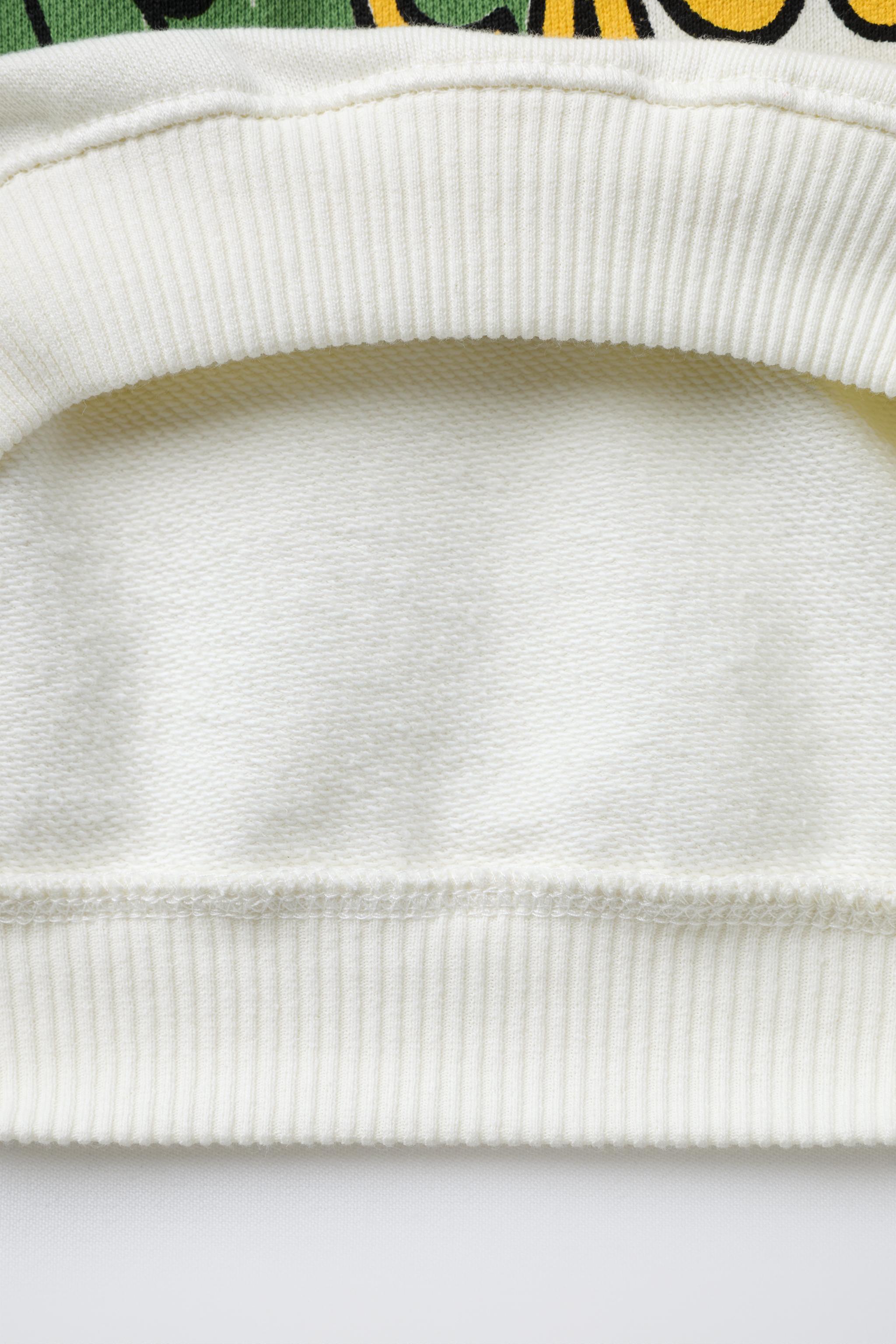 CROCODILE PRINT SWEATSHIRT