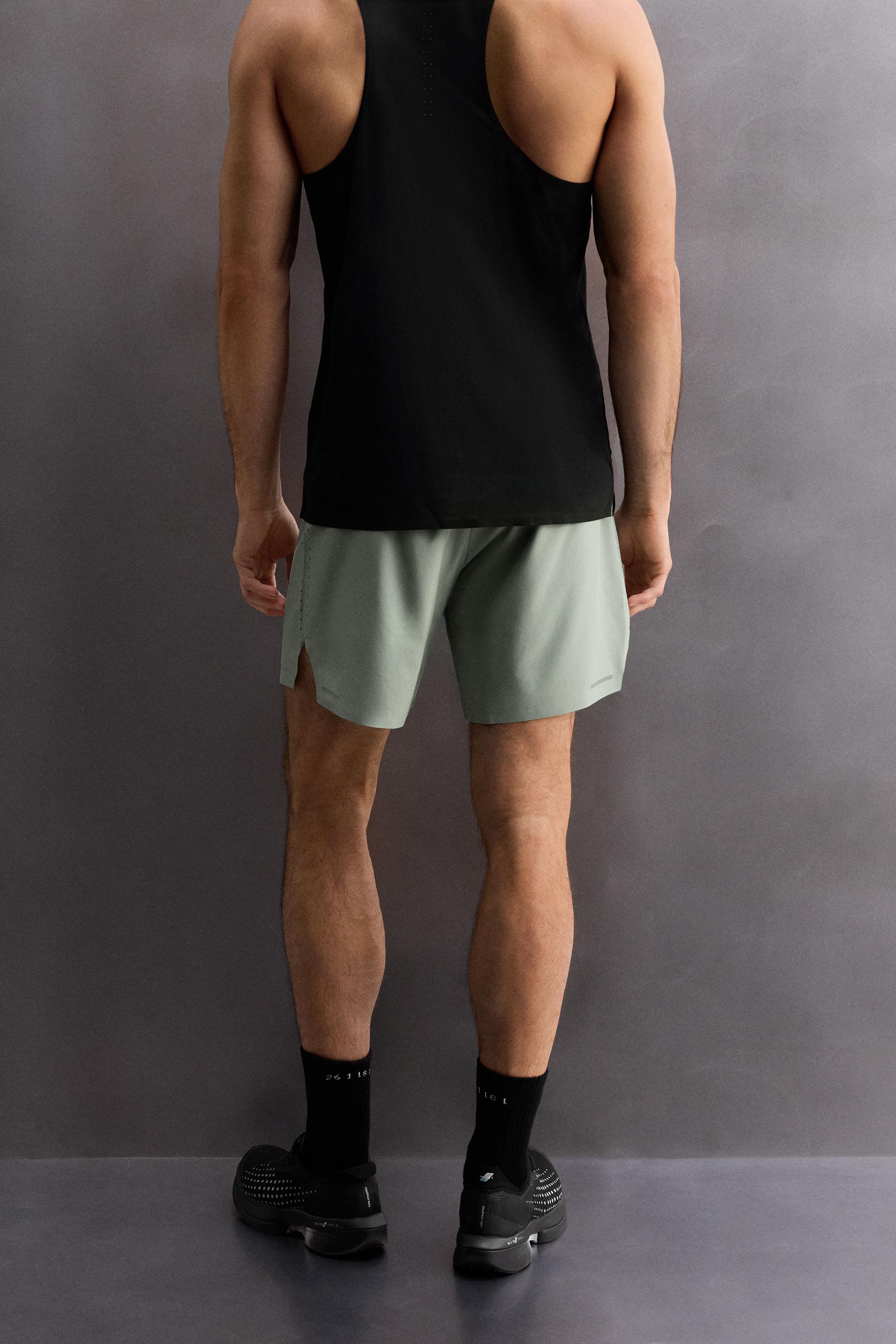 LIGHTWEIGHT PERFORATED SHORTS