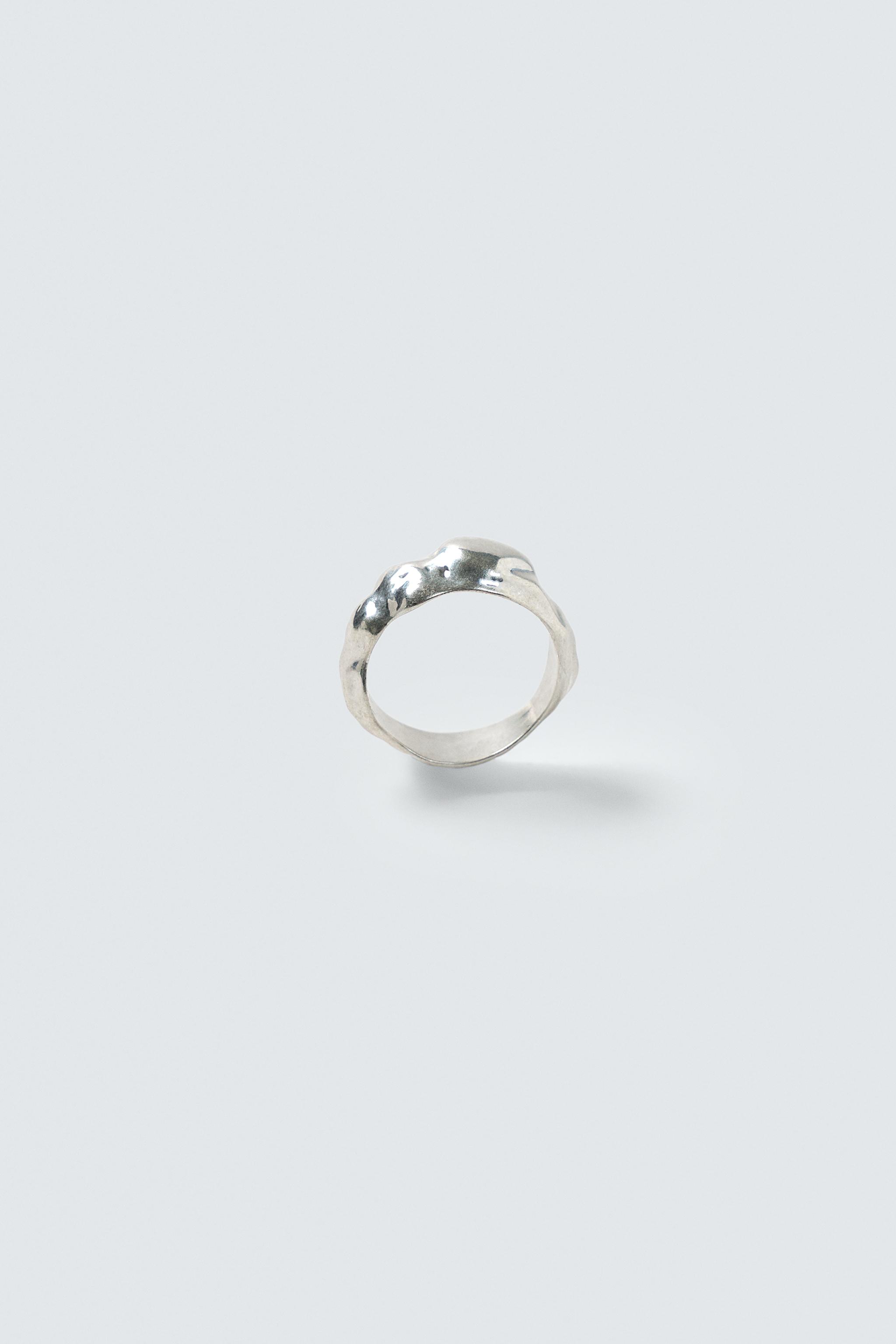 IRREGULAR METAL RING