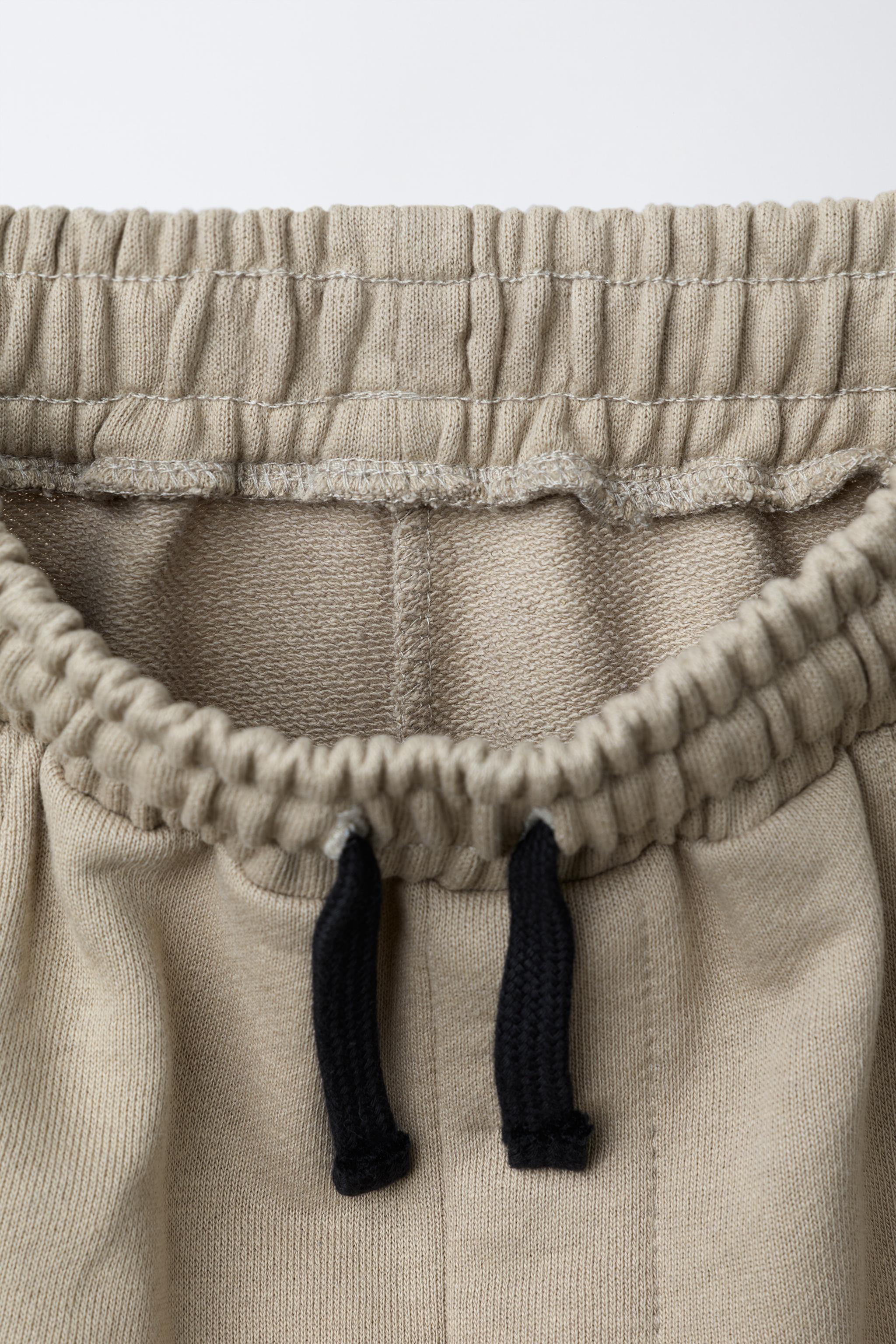 JOGGING PANTS WITH ZIPPERS