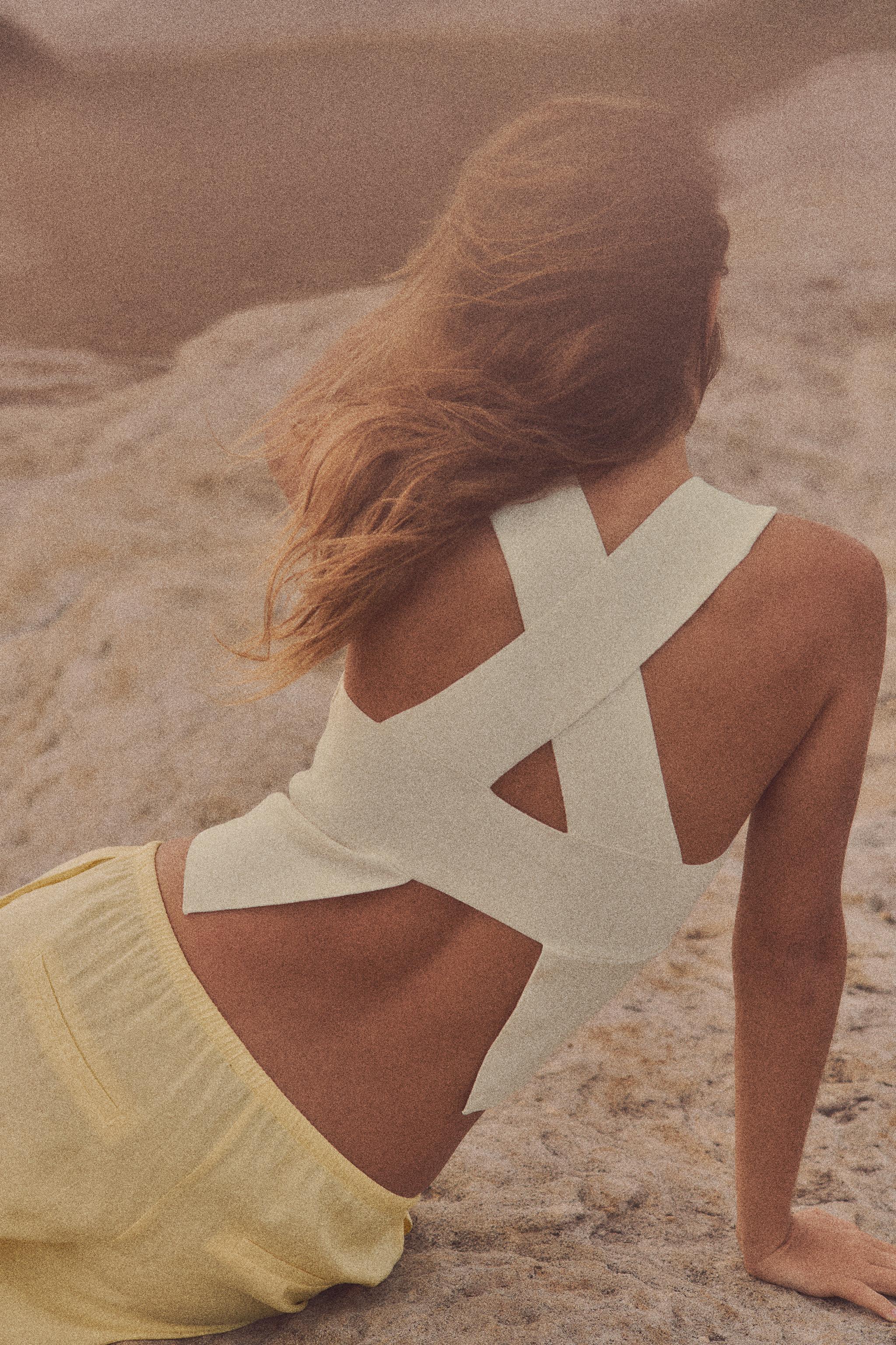 CUT OUT BACK KNIT TOP