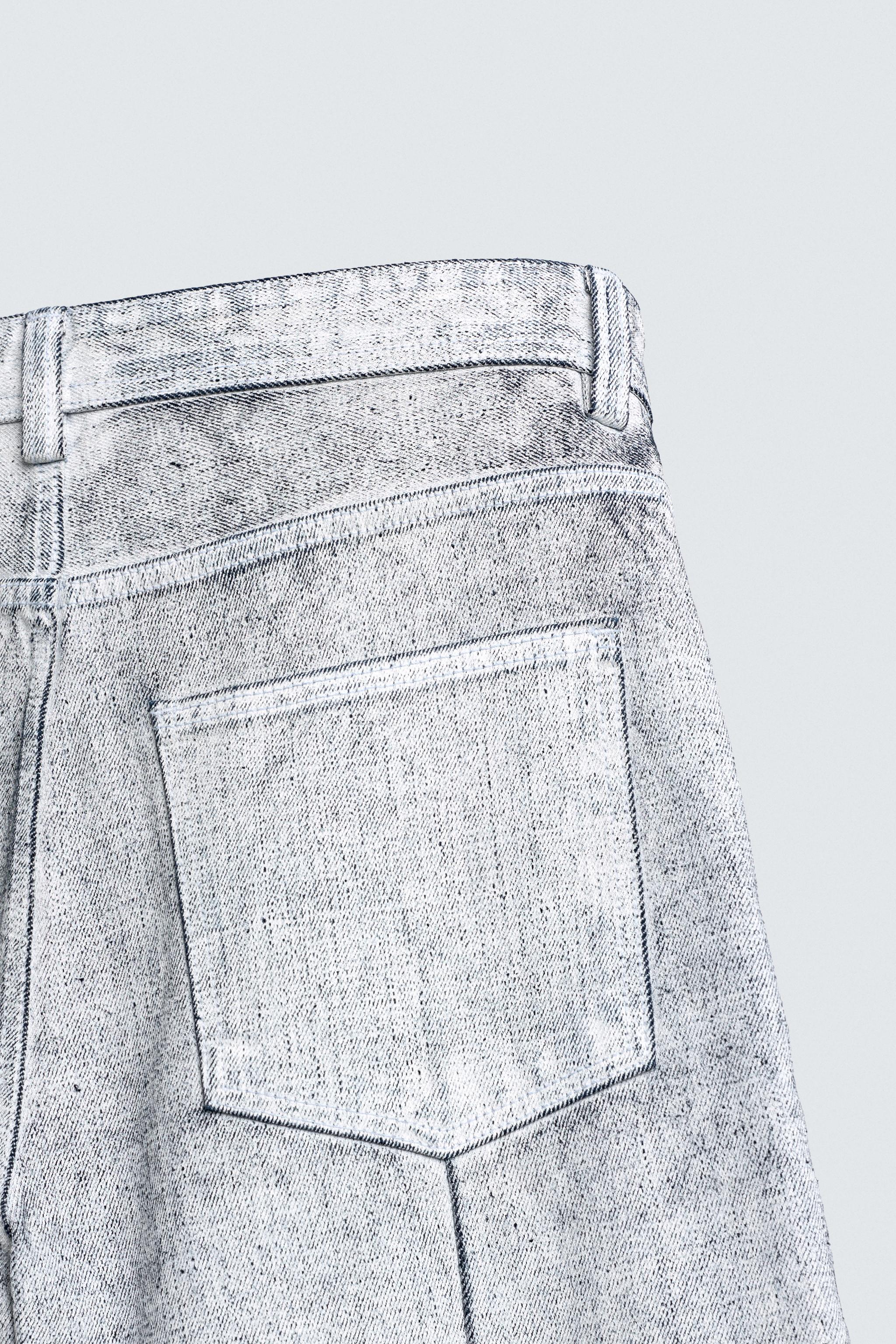 WAXED FINISH BAGGY FIT JEANS