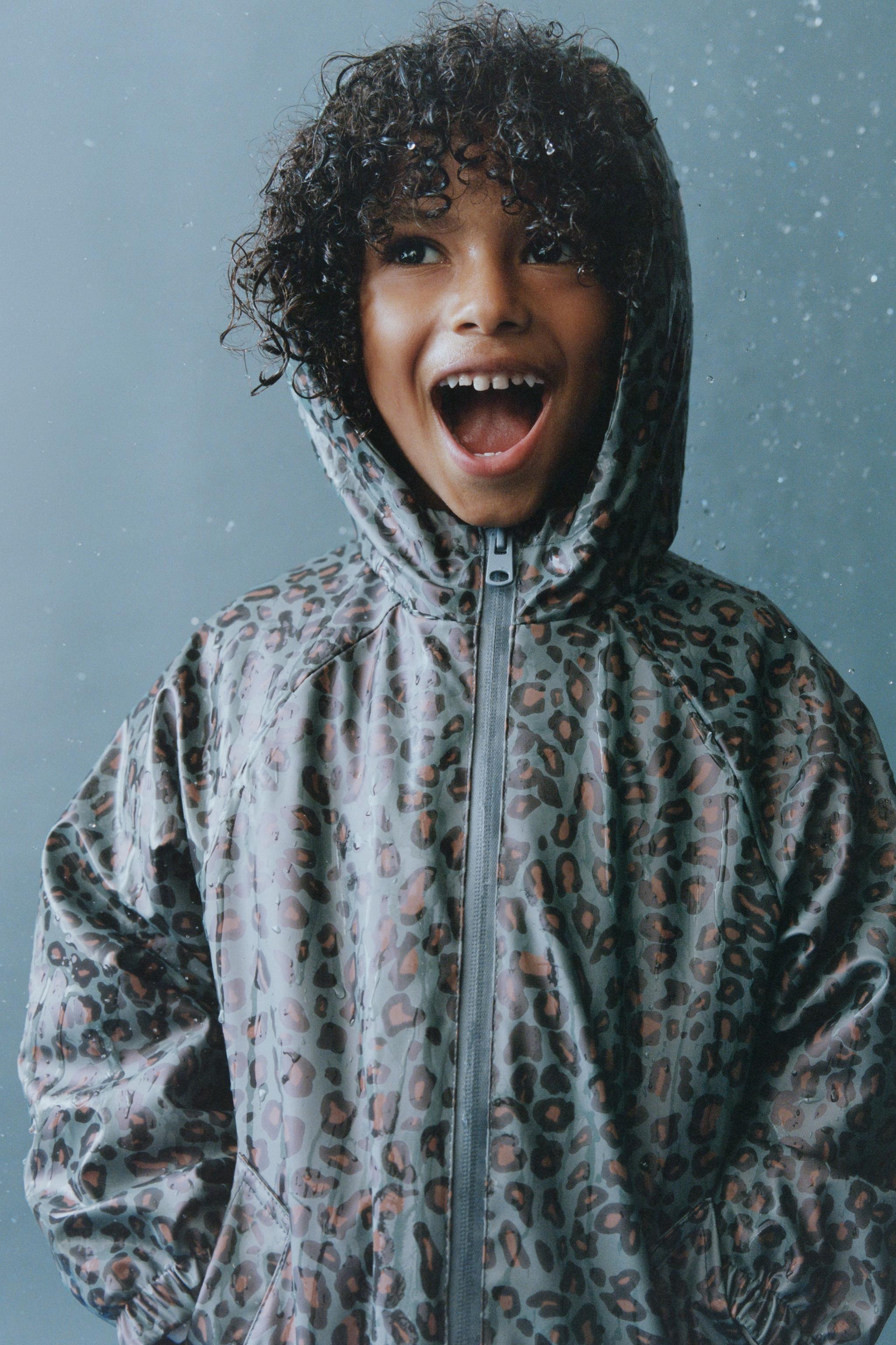 ANIMAL PRINT RUBBERIZED WATER-RESISTANT RAINCOAT