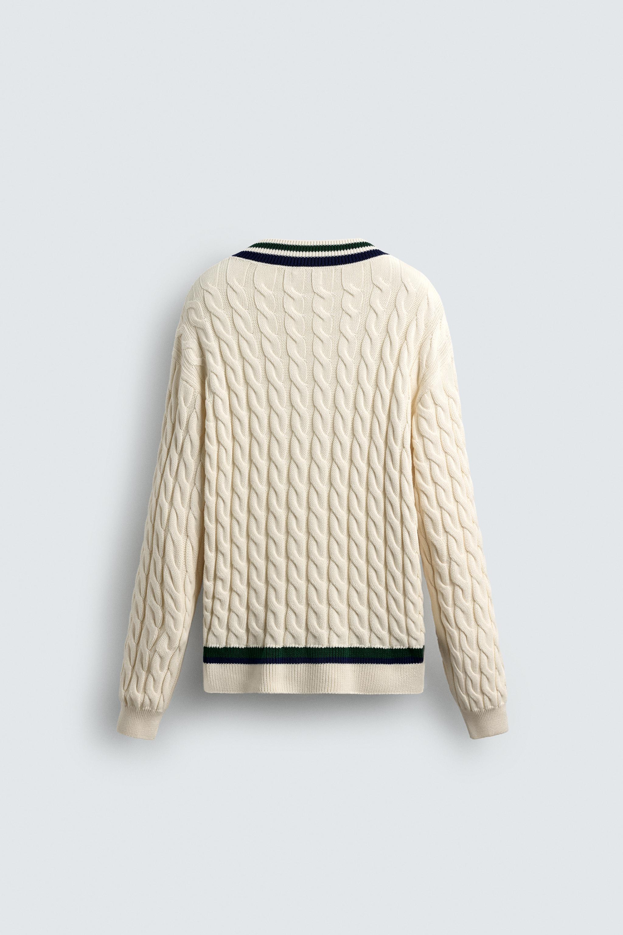 CABLE KNIT SWEATER