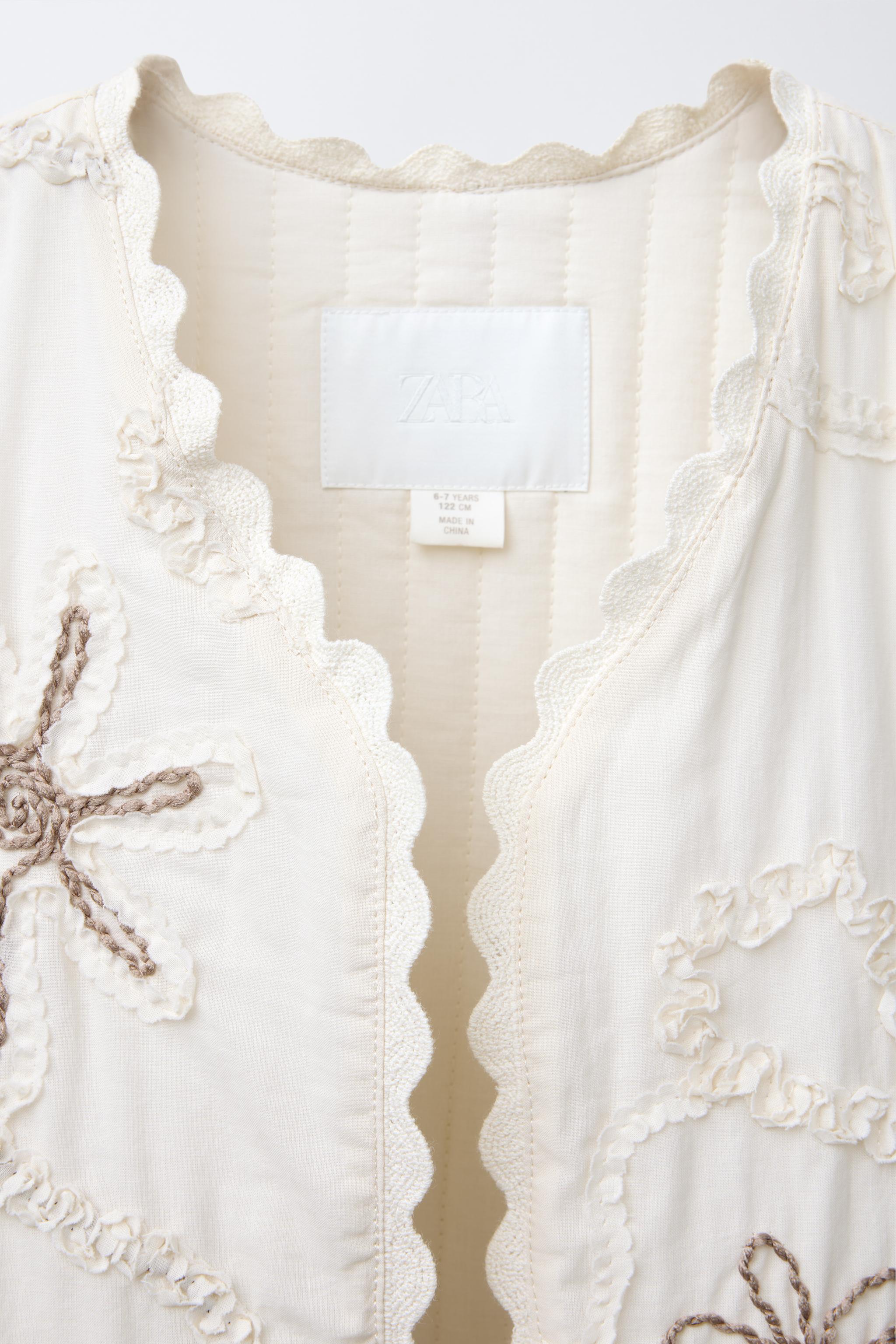 EMBROIDERED FLOWER VEST