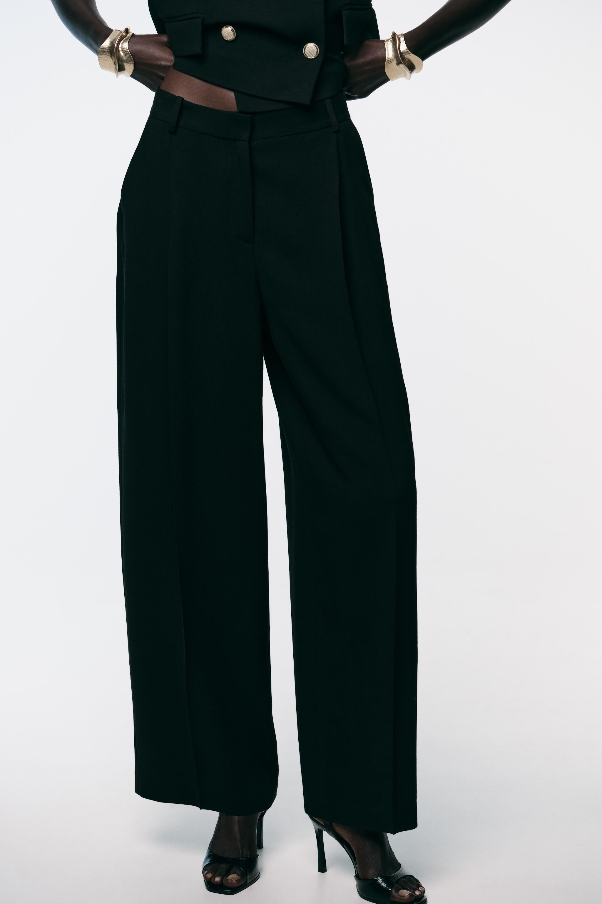 WIDE LEG PLEATED PANTS