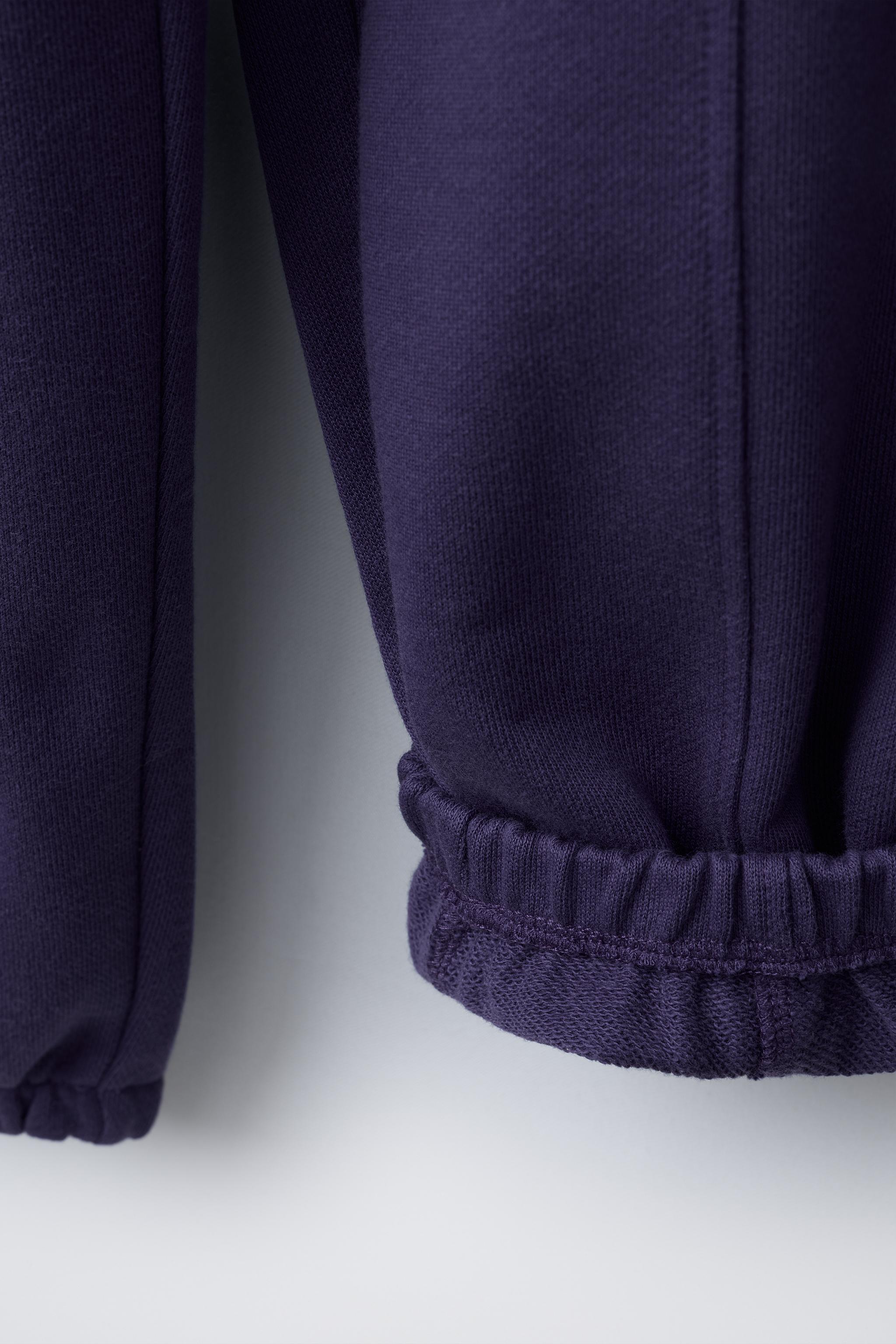 EMBROIDERED TEXT PLUSH JOGGER PANTS