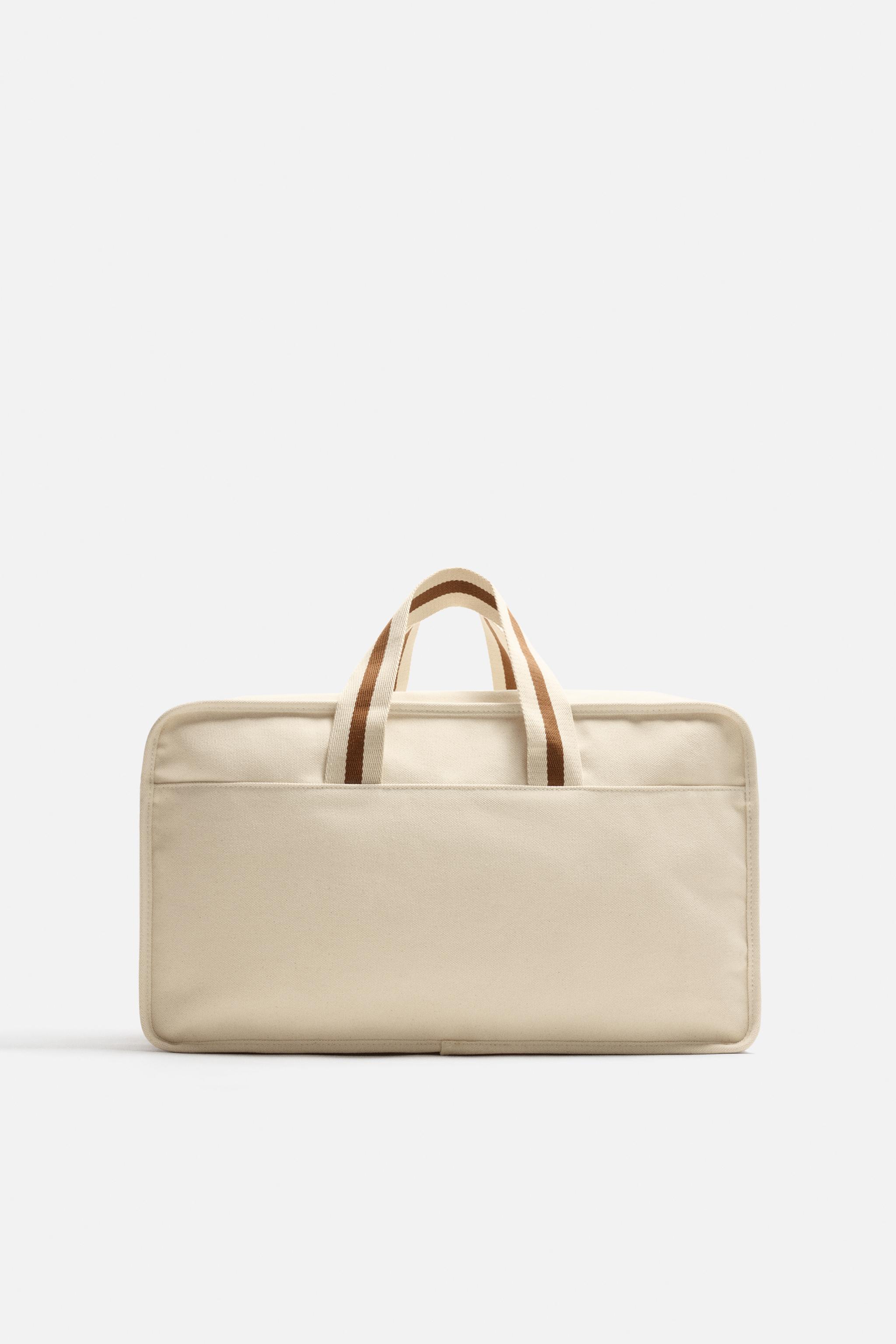 CONTRAST TRAVEL BAG