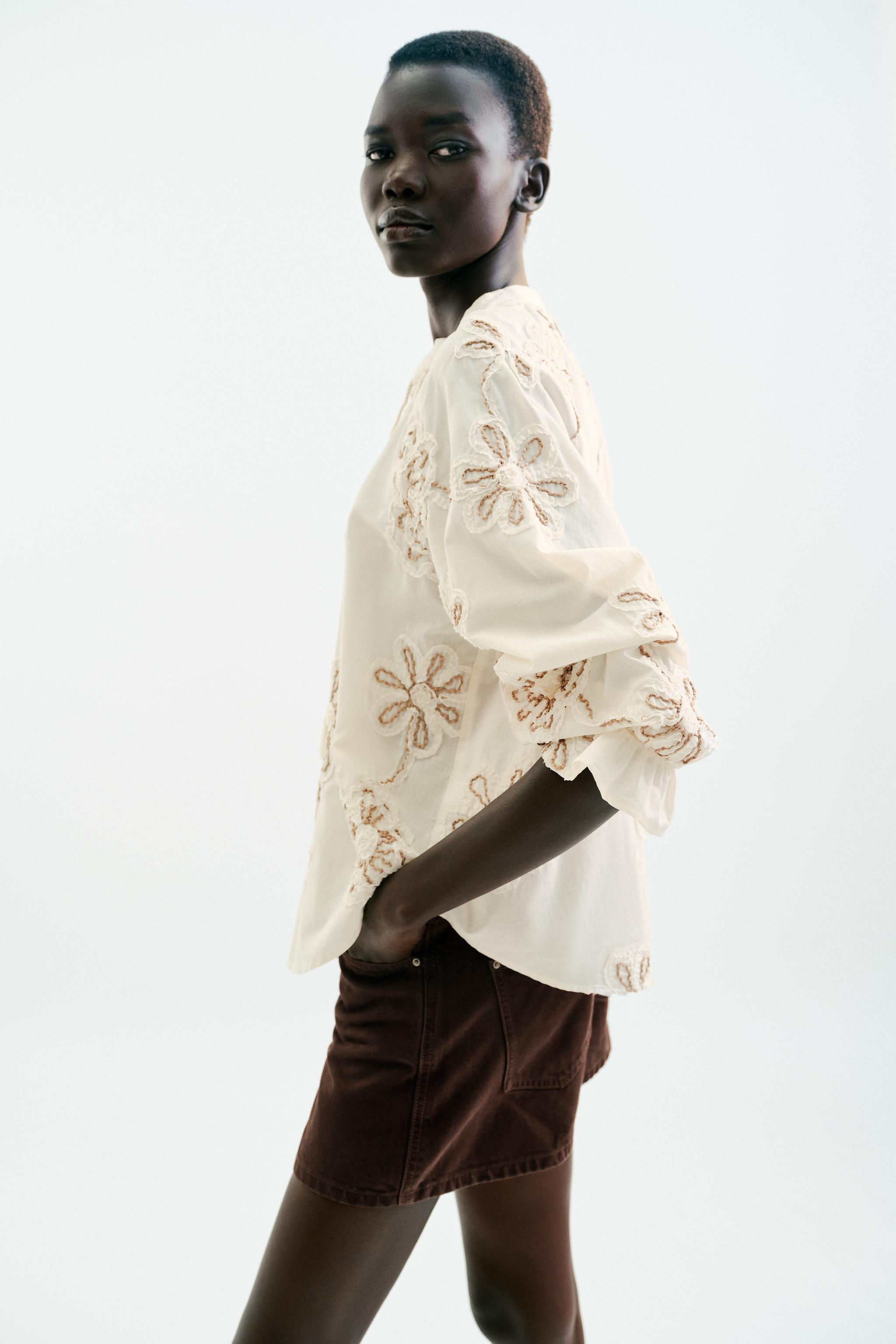 TEXTURED EMBROIDERED BLOUSE