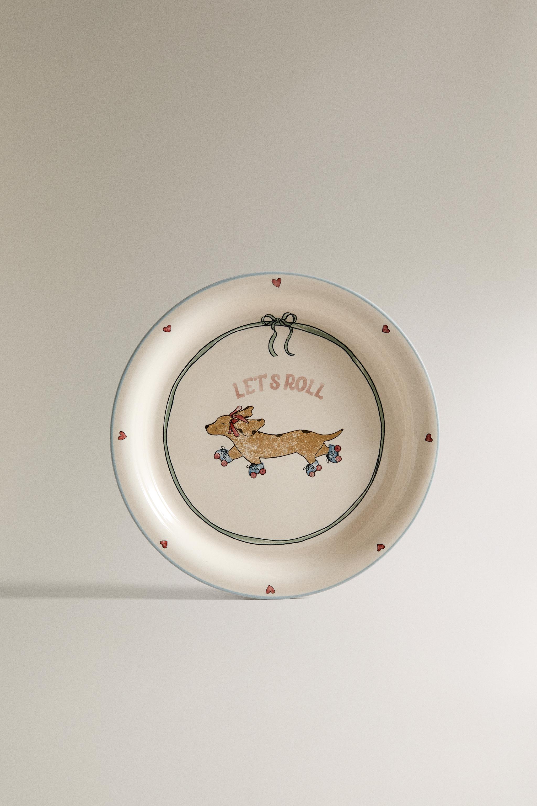 CHILDREN'S CERAMIC SKATING DOG PLATE