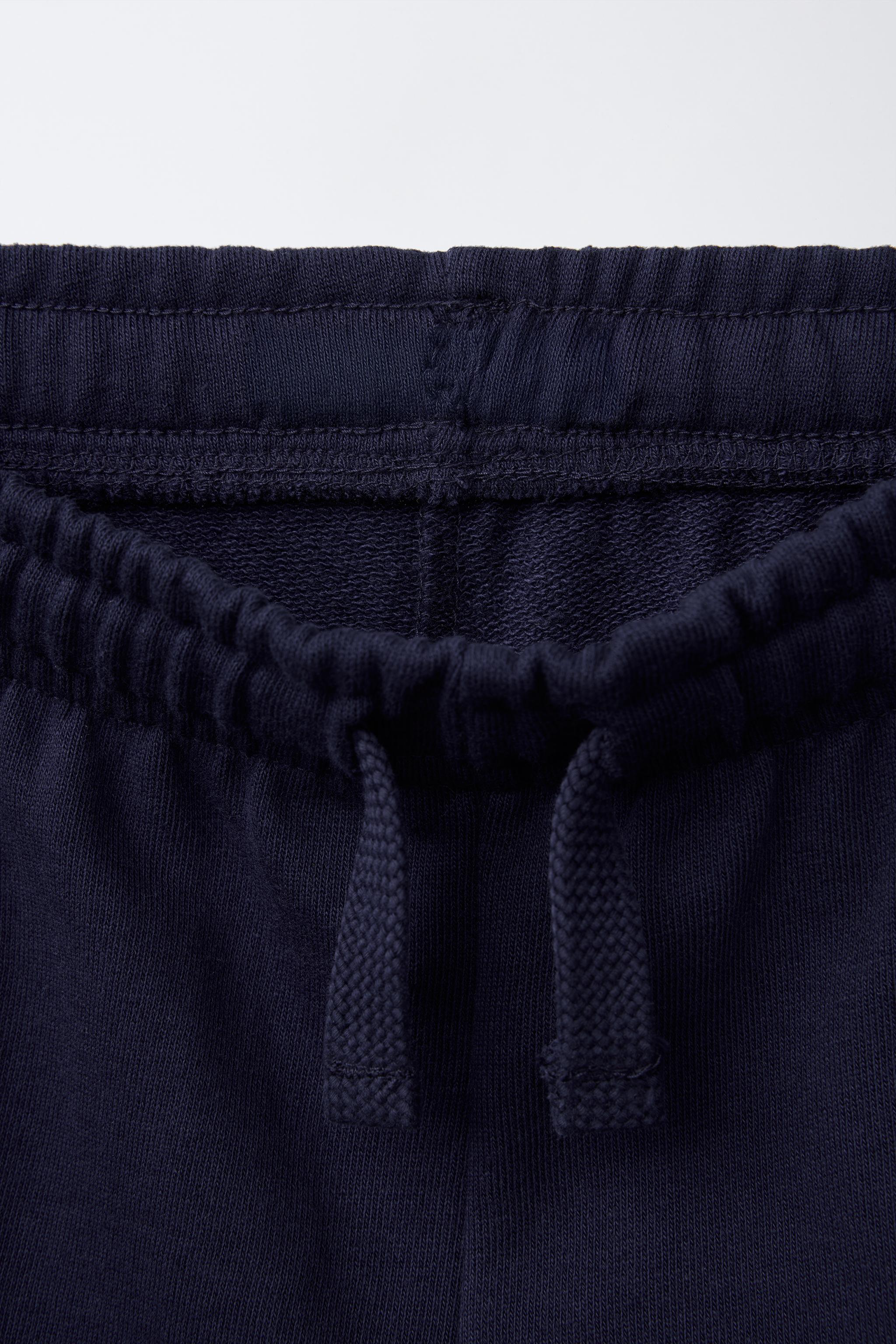 CONTRAST PIPING JOGGING SHORTS