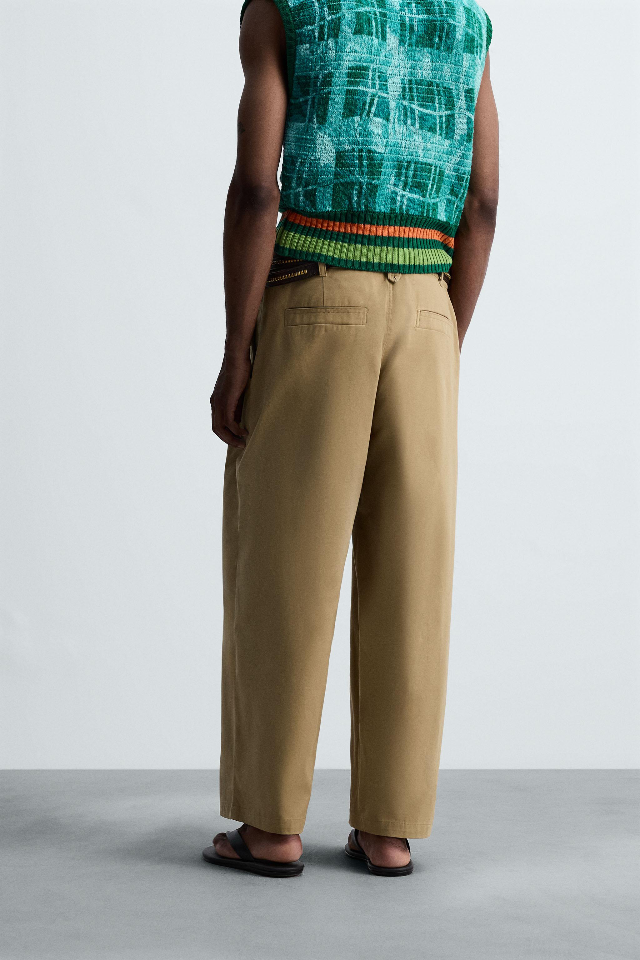 PLEATED WIDE FIT PANTS