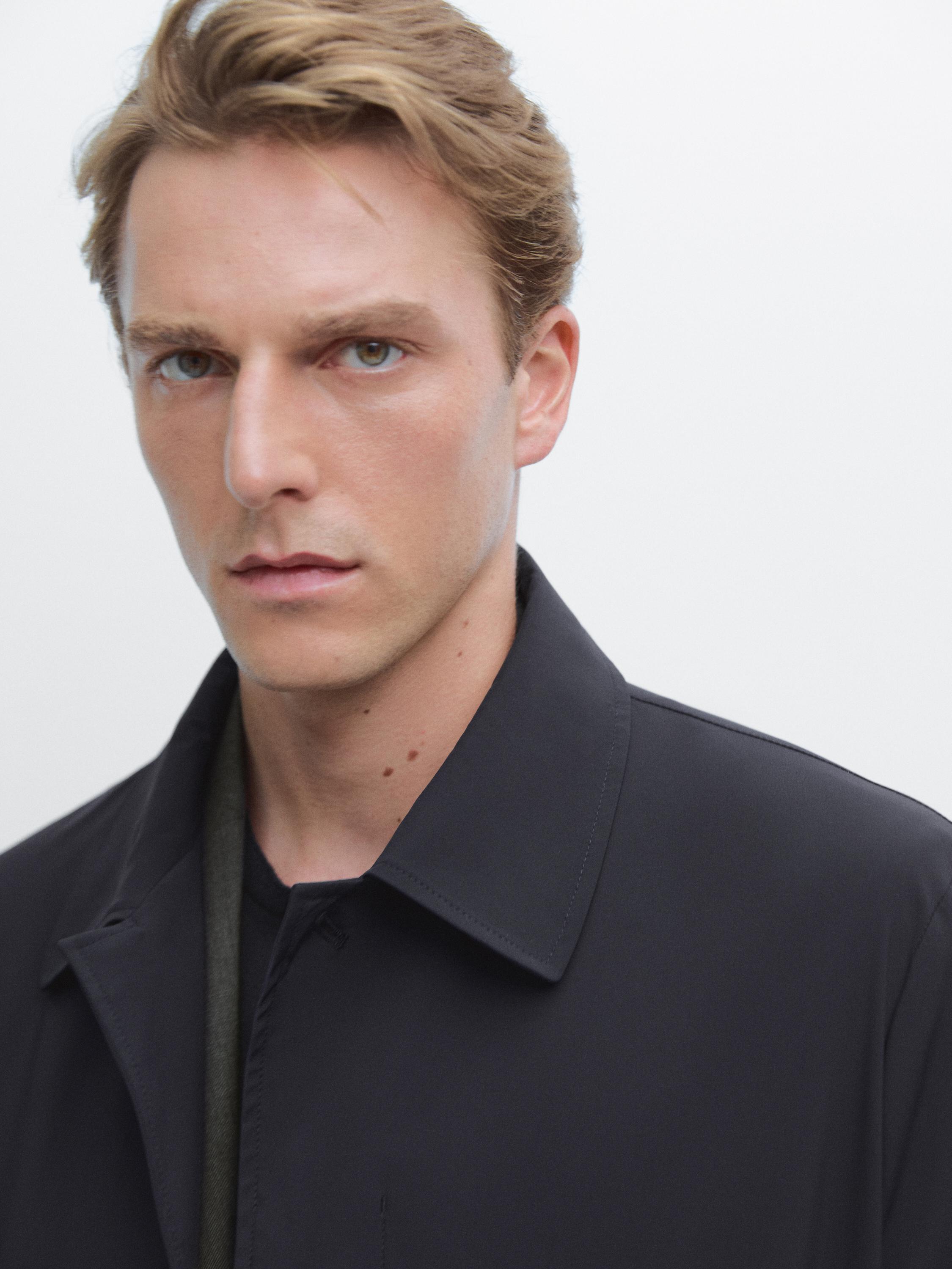 Lightweight trench coat with hidden buttons