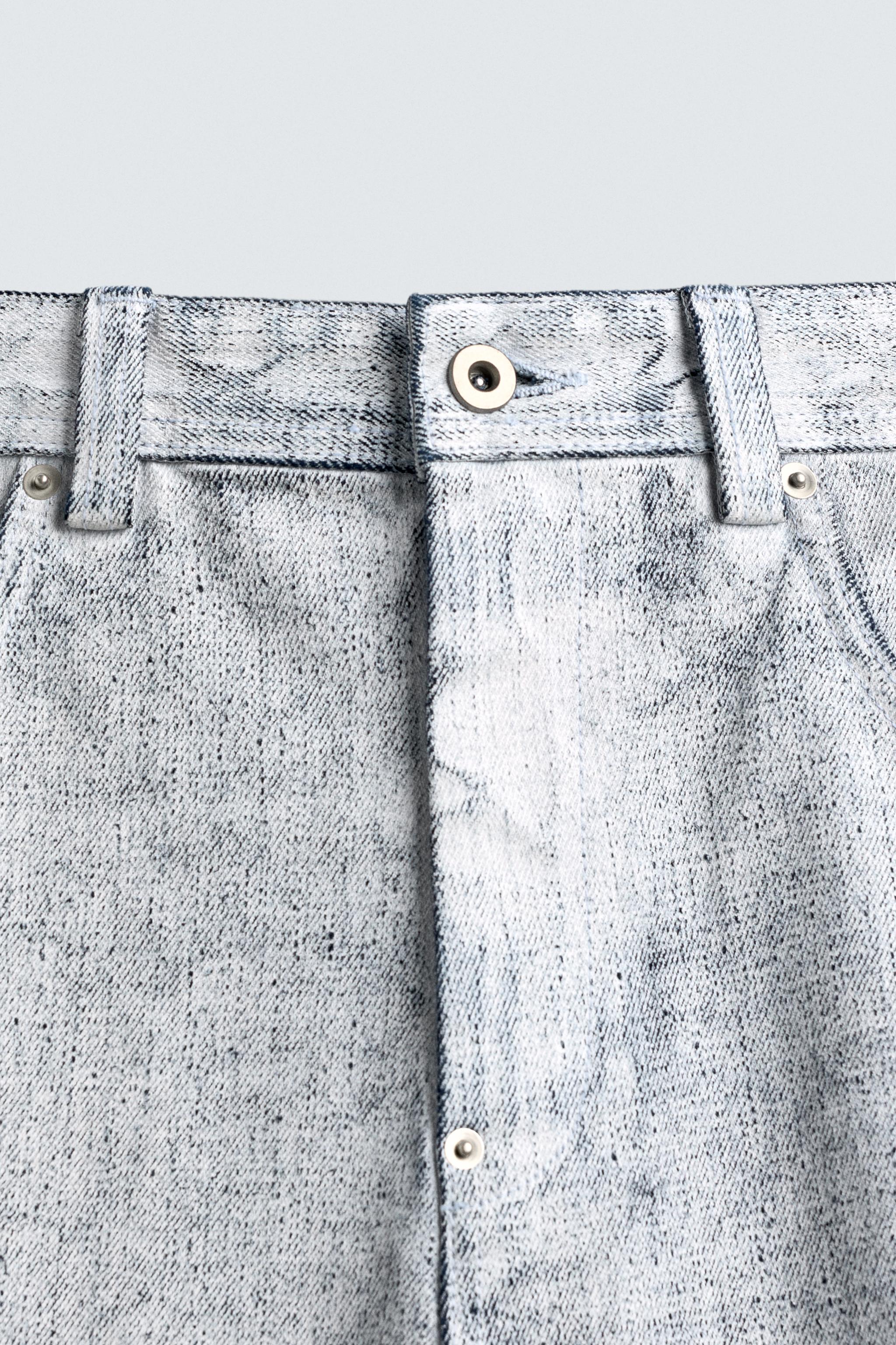 WAXED FINISH BAGGY FIT JEANS