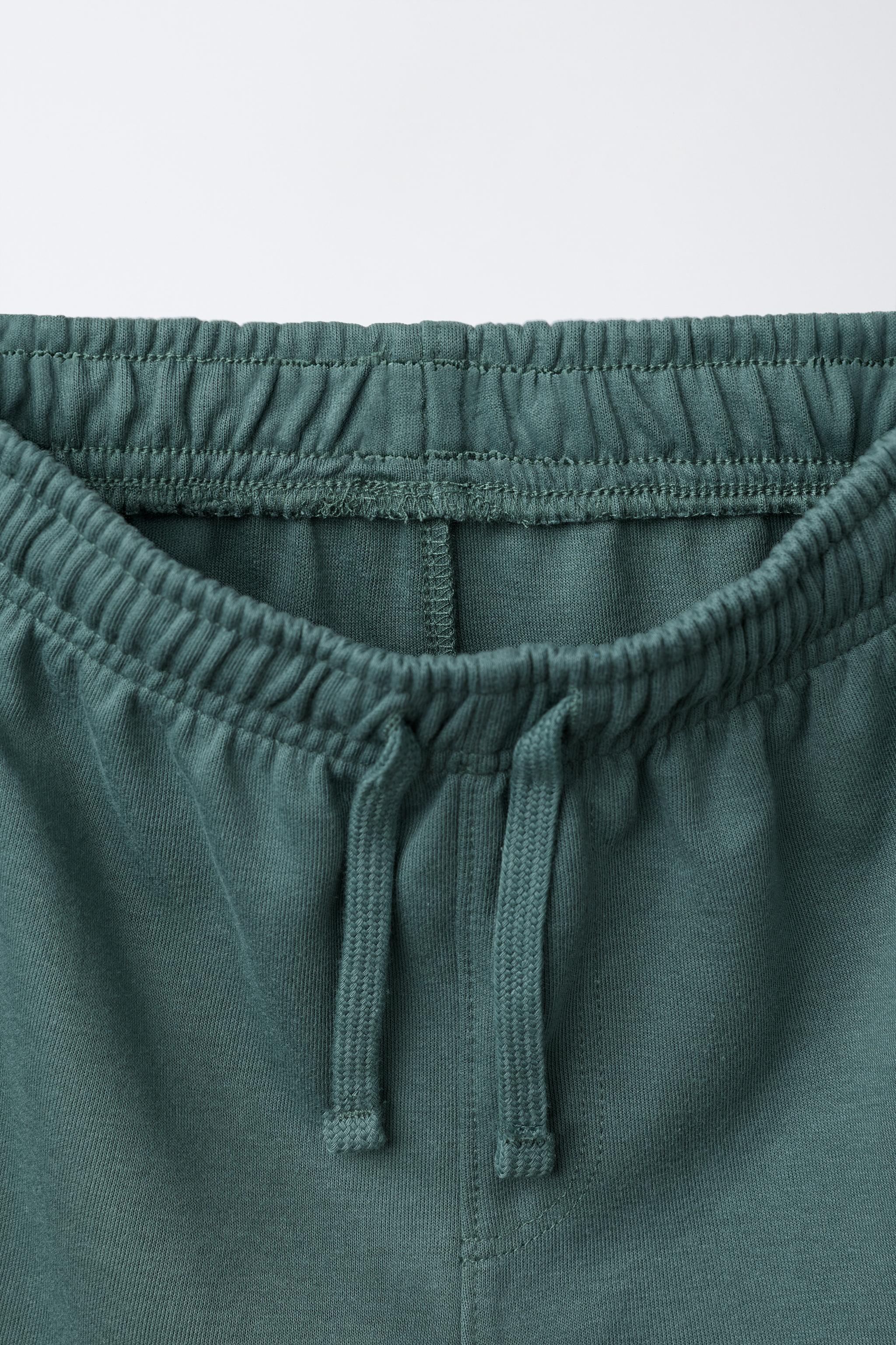 SHORT SLEEVE HOODIE AND INTERLOCK BERMUDA SET