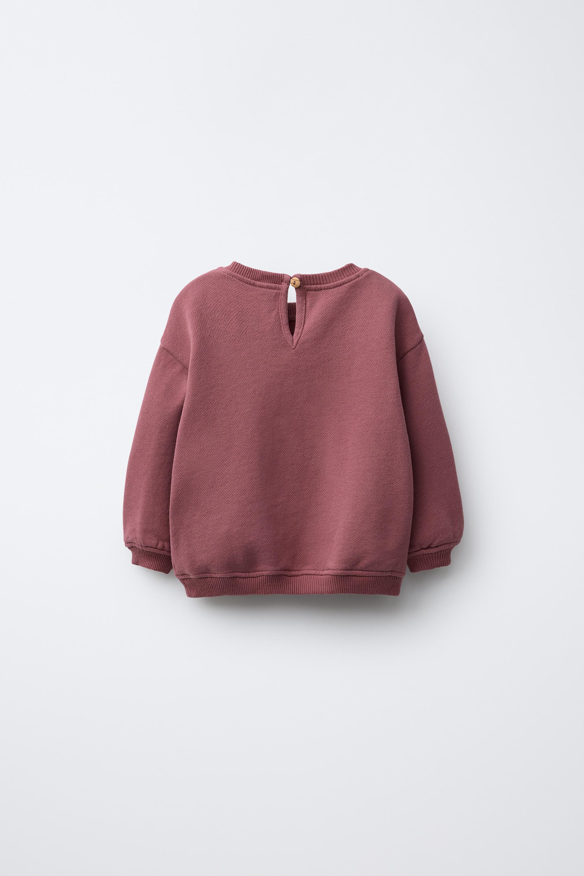 RABBIT APPLIQUÉ SWEATSHIRT