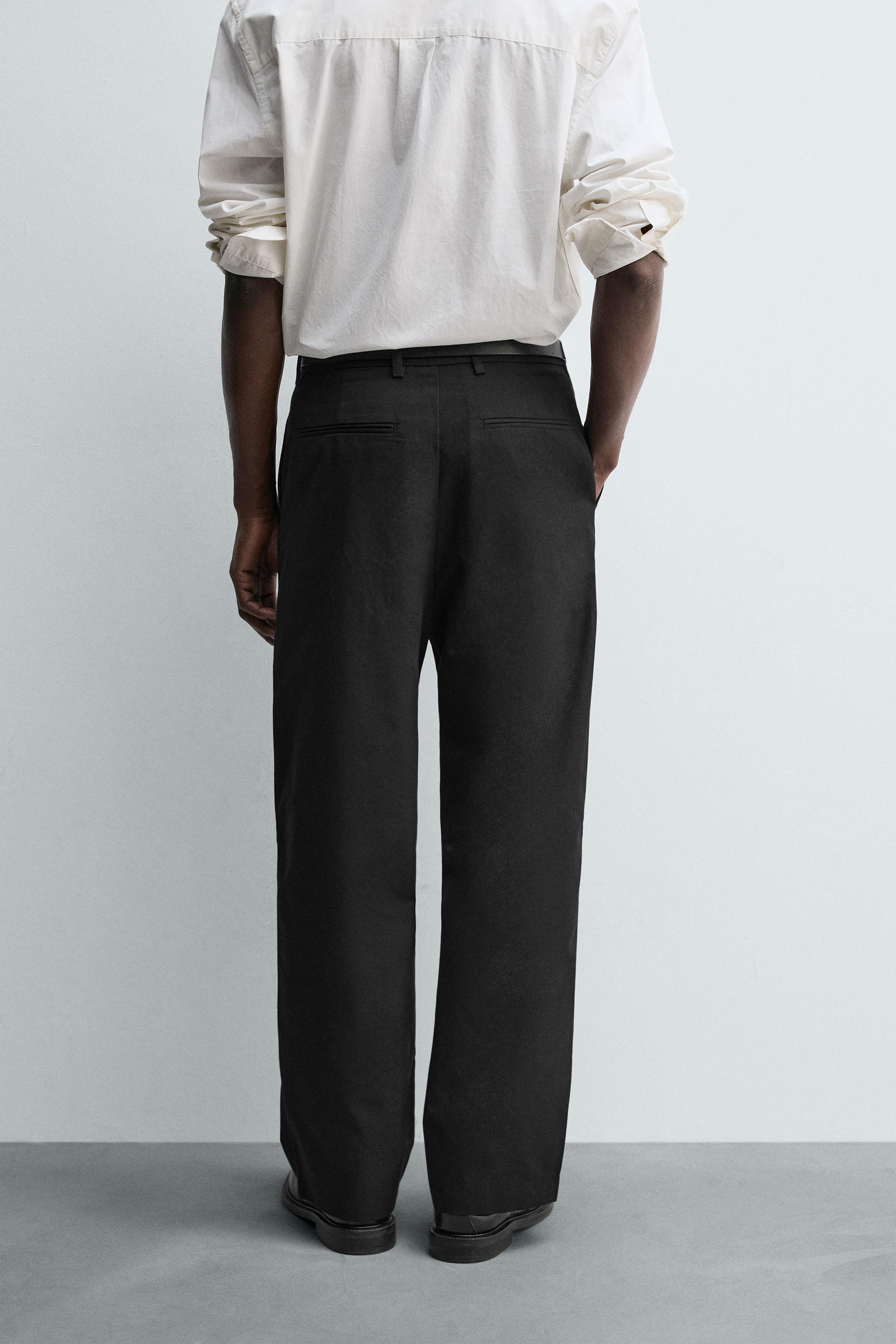 PLEATED WIDE FIT PANTS