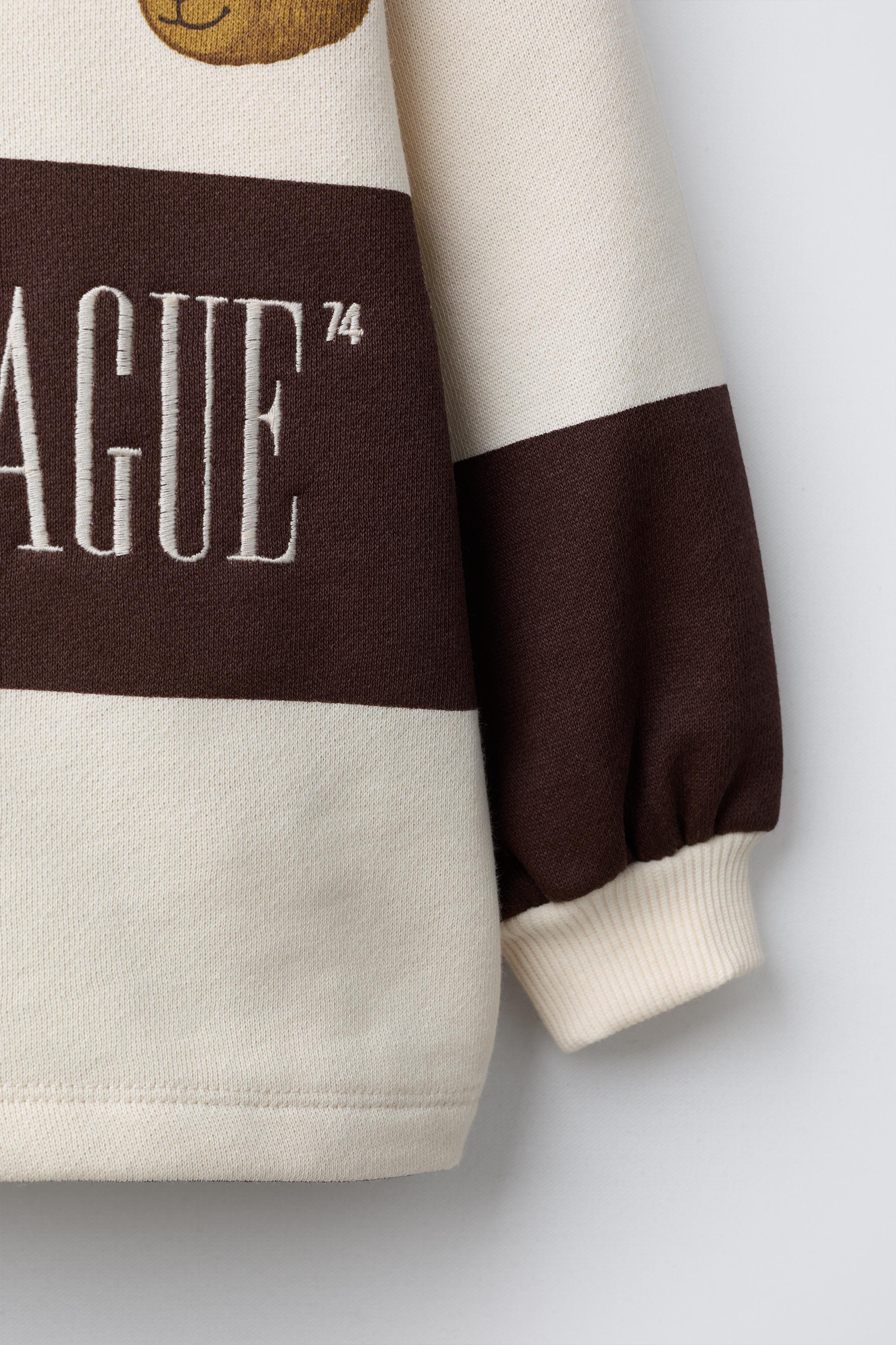 STRIPED POLO SHIRT WITH EMBROIDERED BEAR