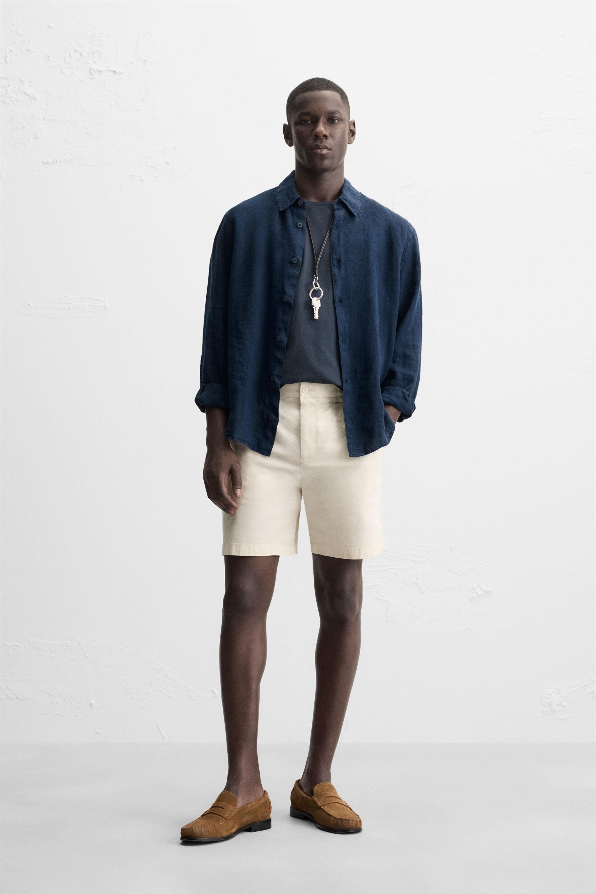 REGULAR FIT PLEATED BERMUDA SHORTS