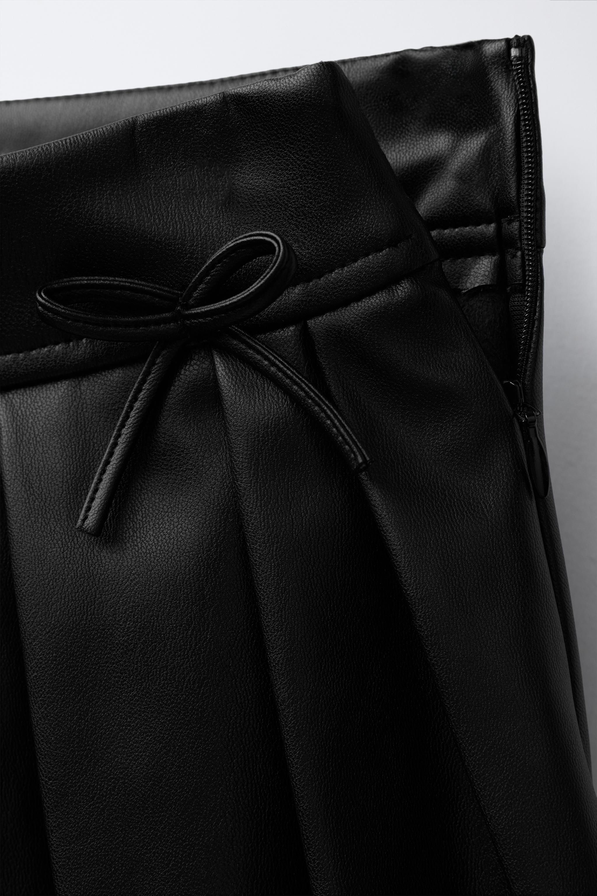 FAUX LEATHER BOX PLEAT SKIRT WITH TIES