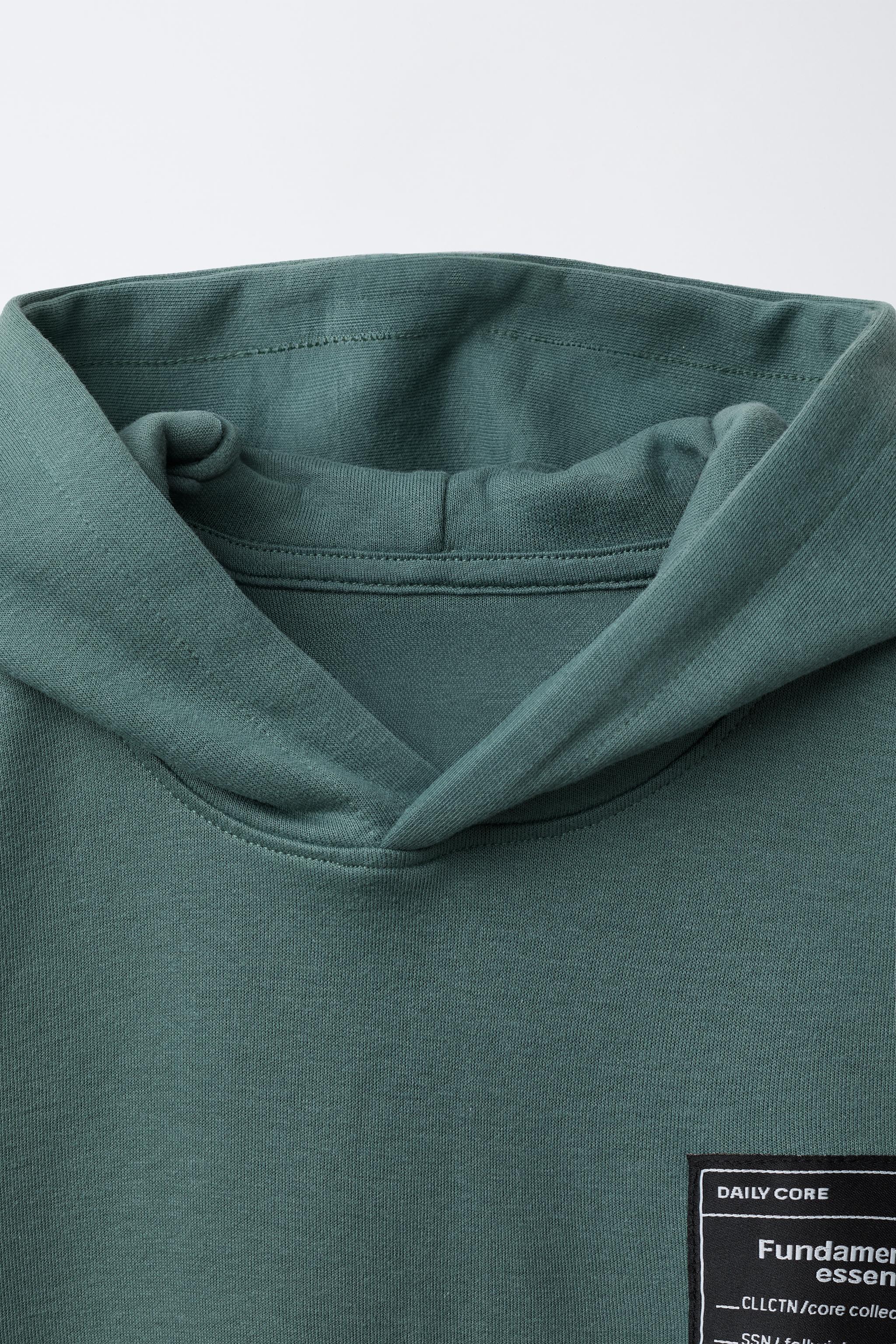 SHORT SLEEVE HOODIE AND INTERLOCK BERMUDA SET