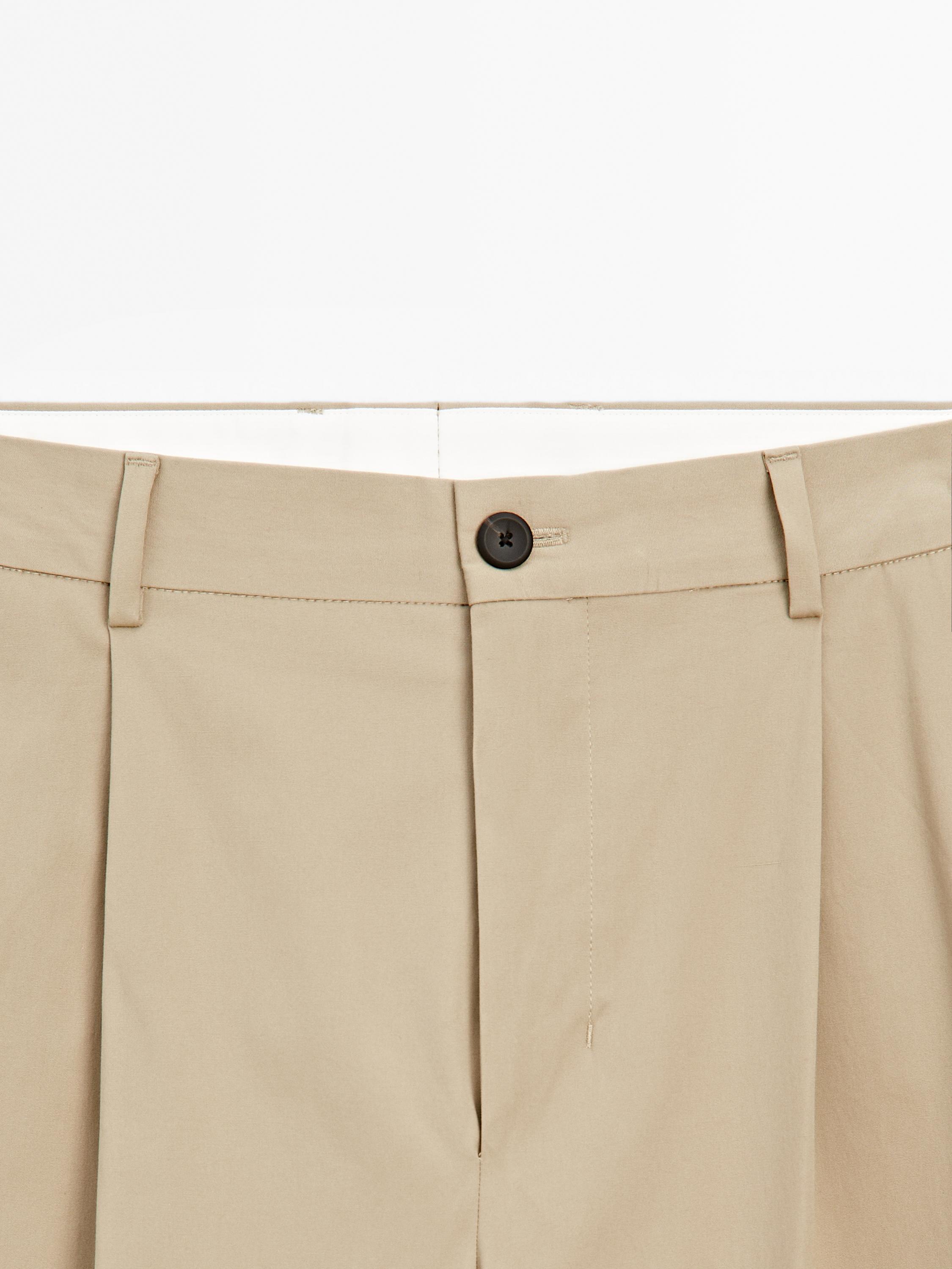 Relaxed-fit trousers with dart detail