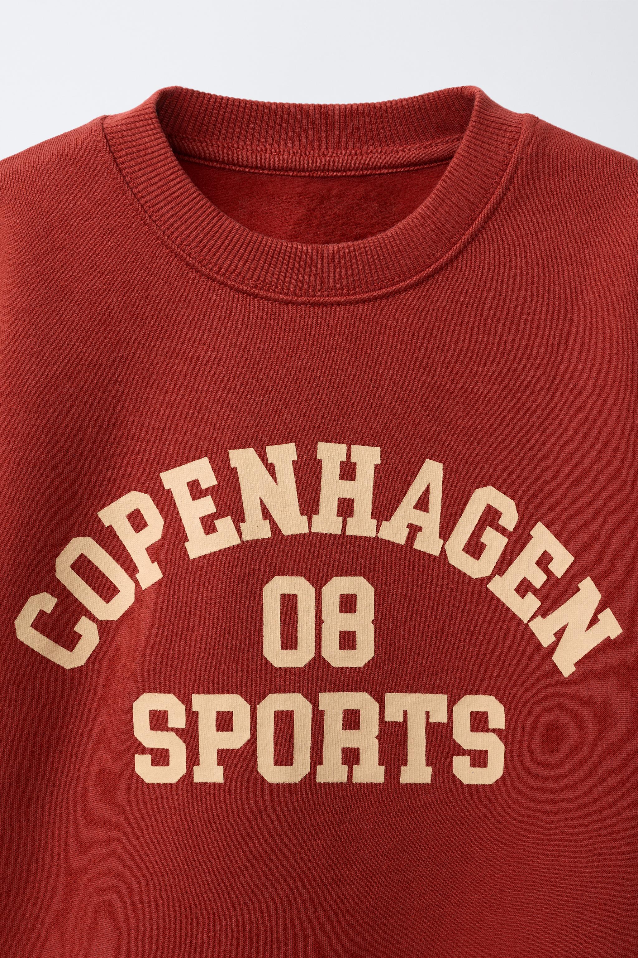 VARSITY PRINT SWEATSHIRT