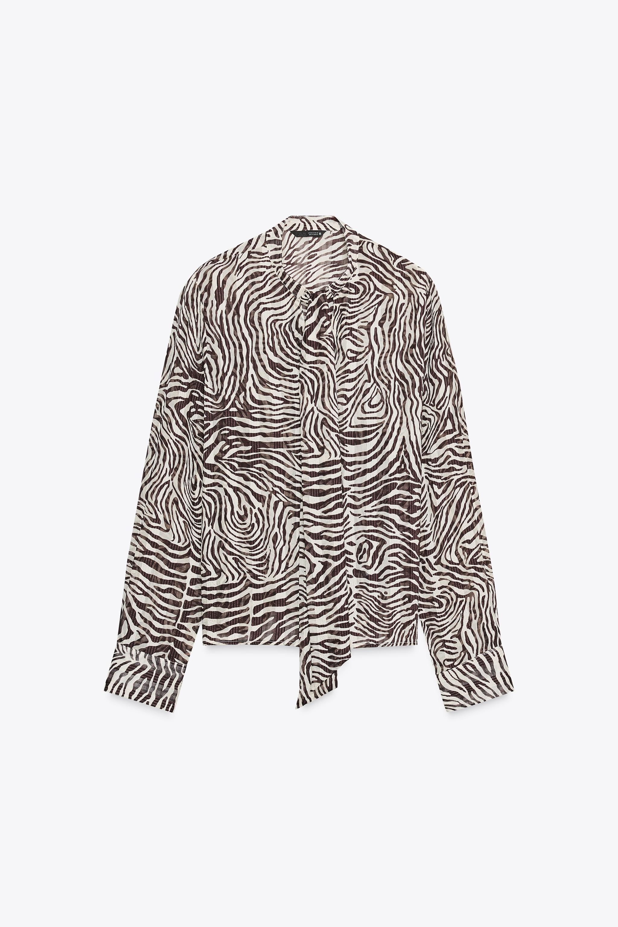 ANIMAL PRINT BOW BLOUSE