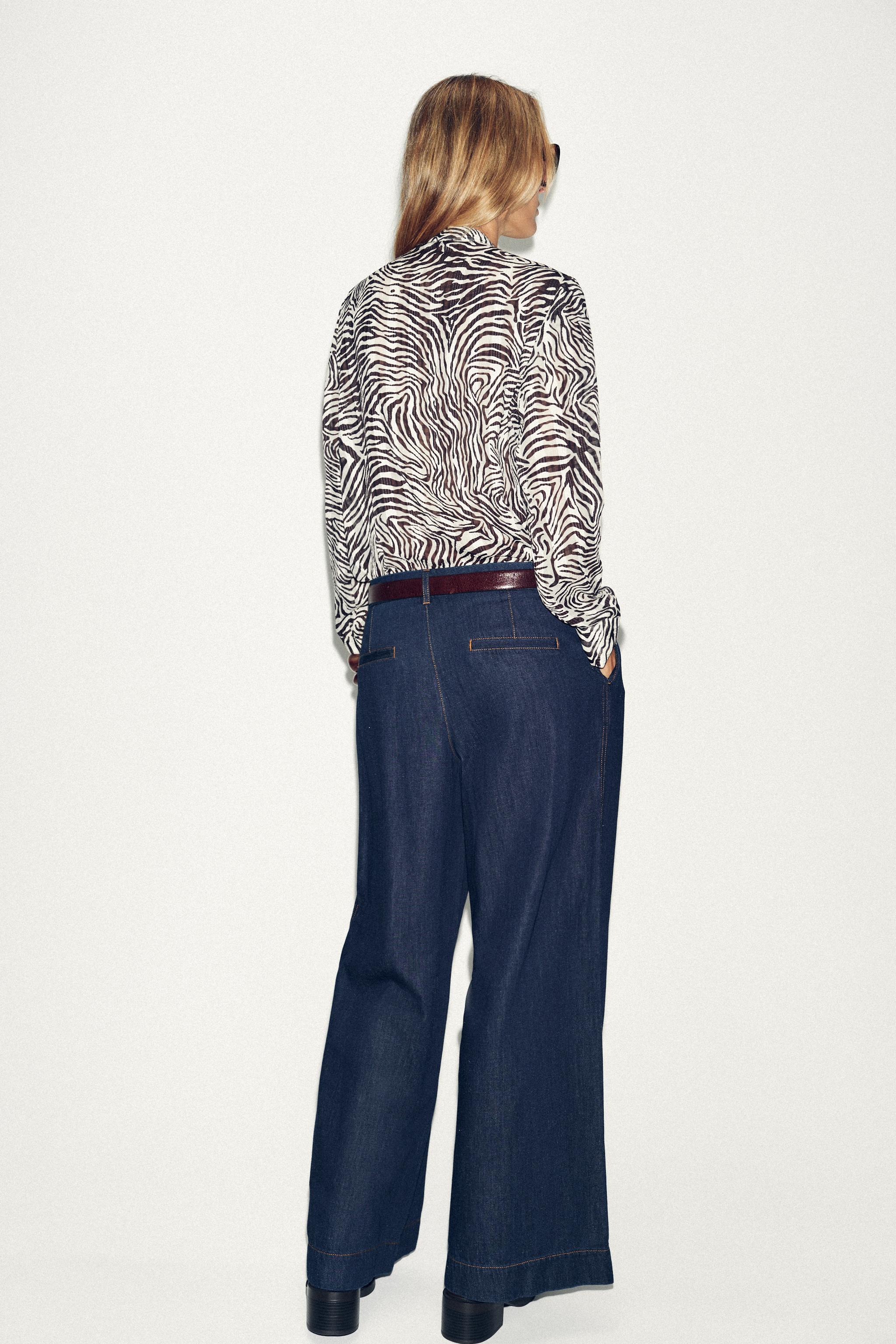 ANIMAL PRINT BOW BLOUSE