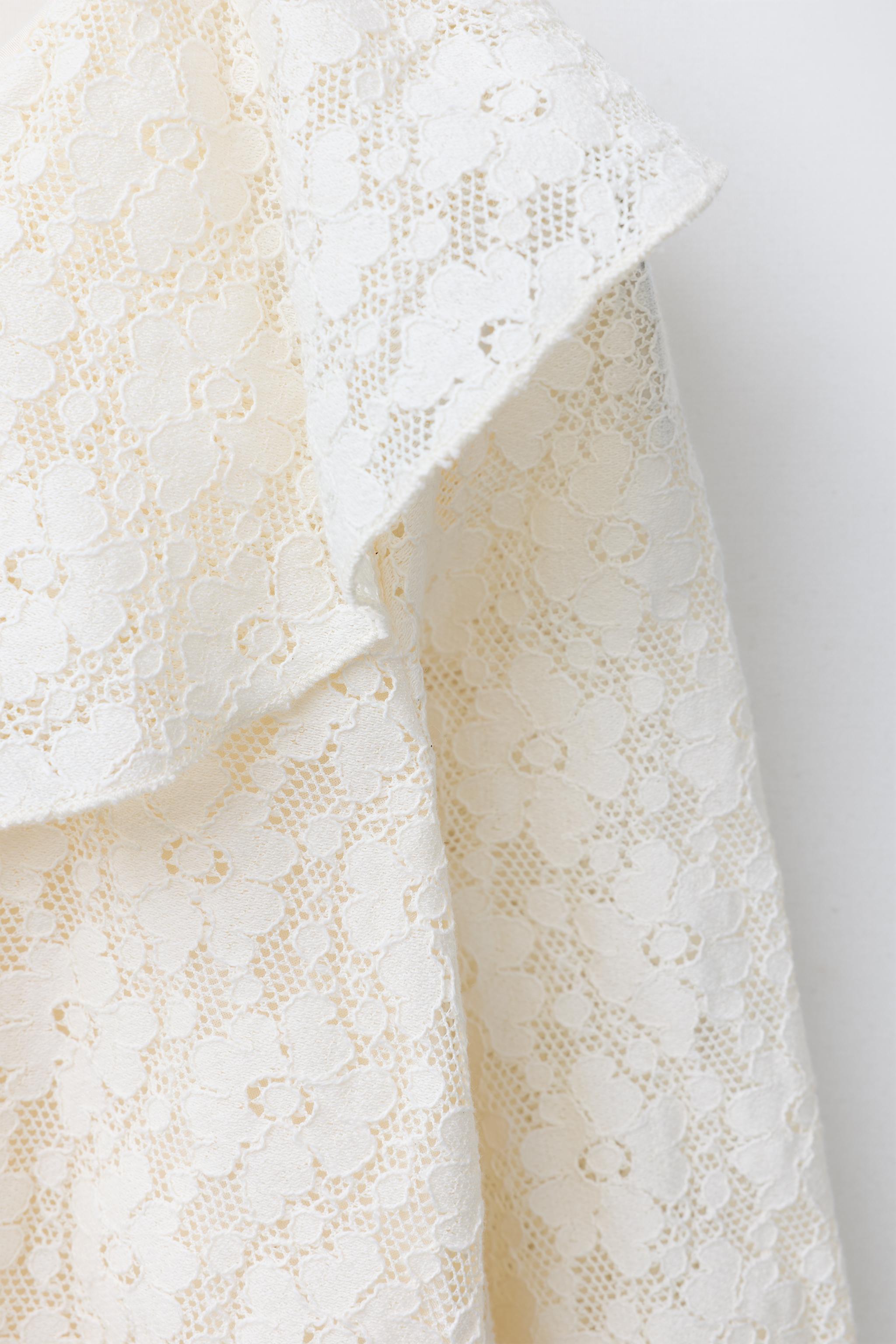 ASYMMETRIC RUFFLED LACE TOP