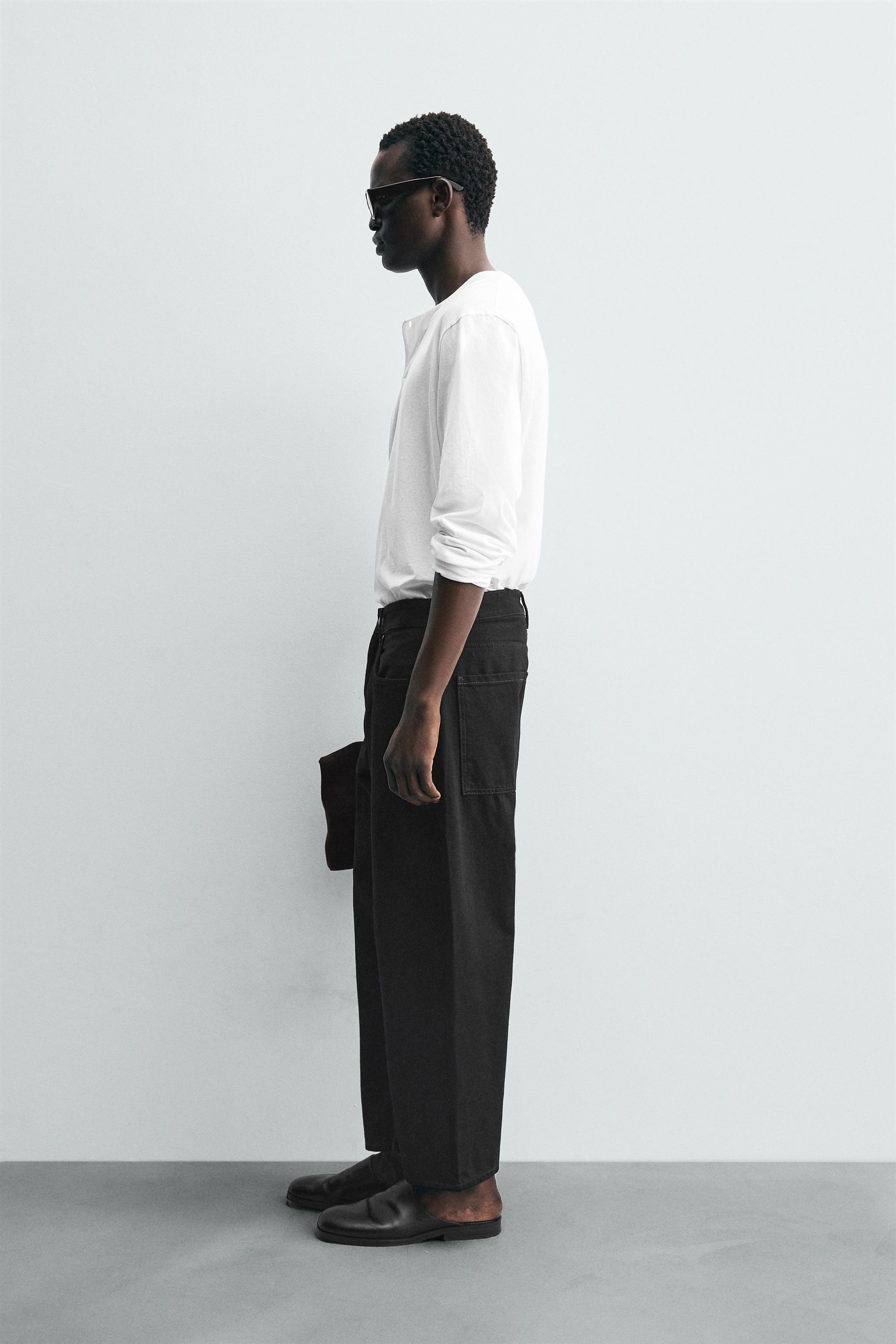 TAPERED WIDE FIT JEANS