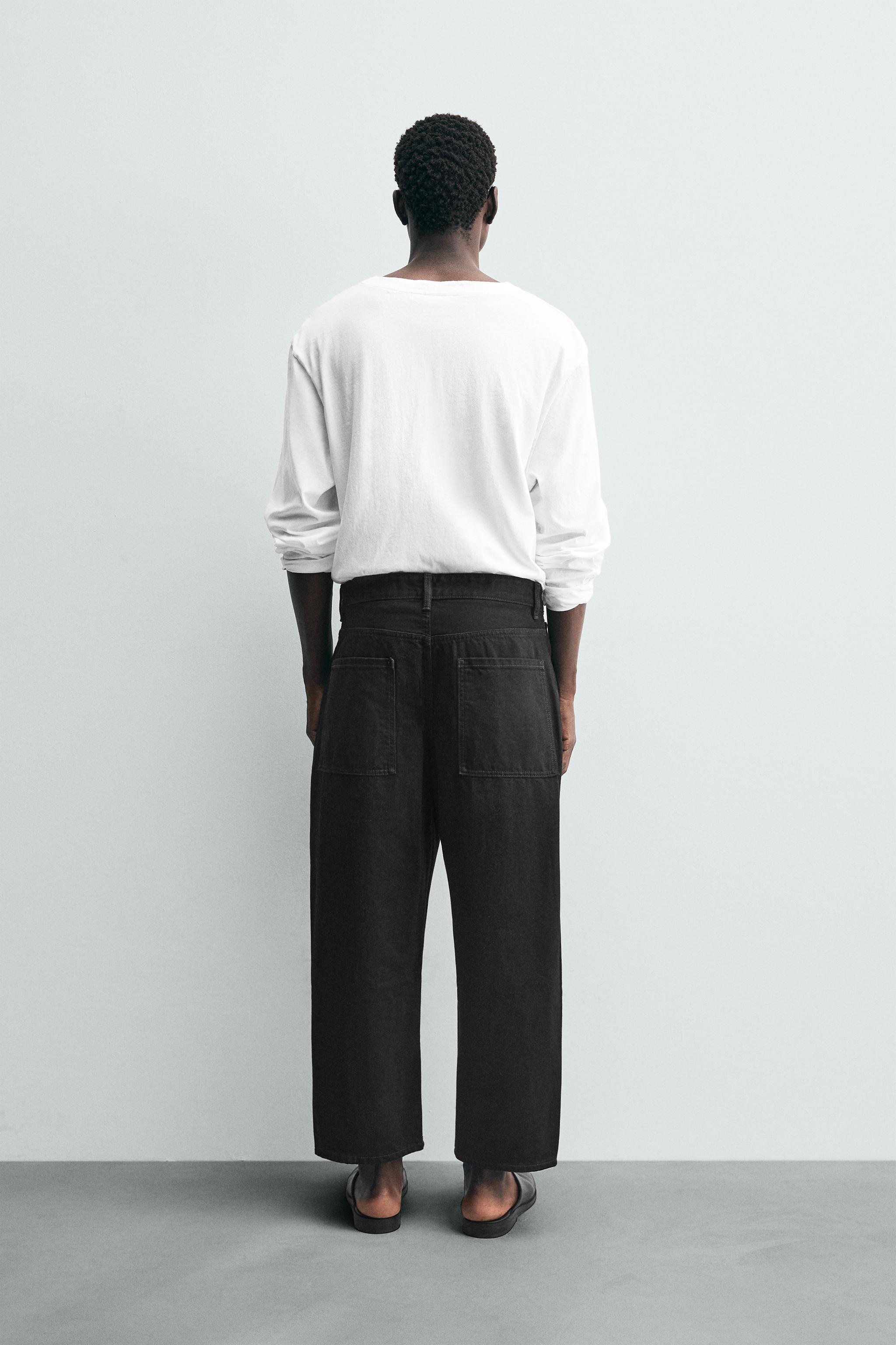 TAPERED WIDE FIT JEANS