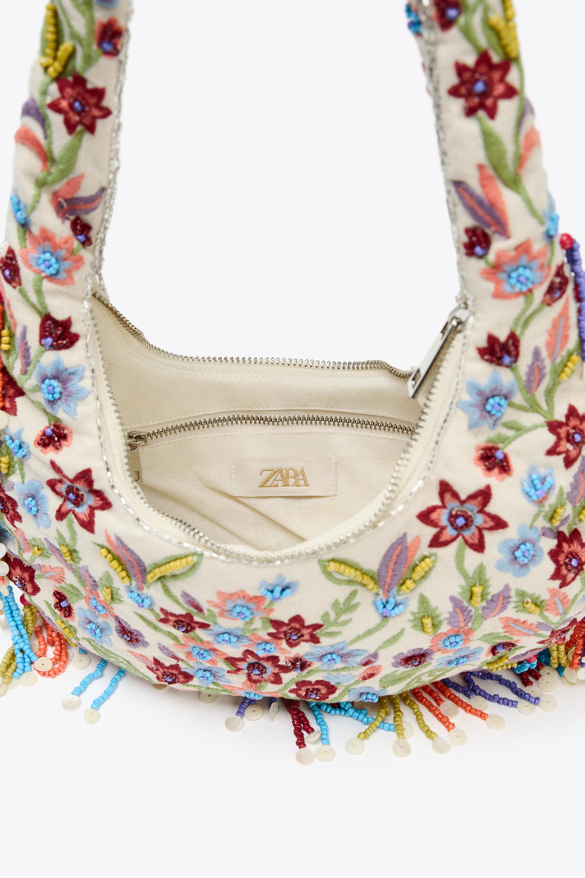 OVAL BAG WITH FLORAL EMBROIDERY