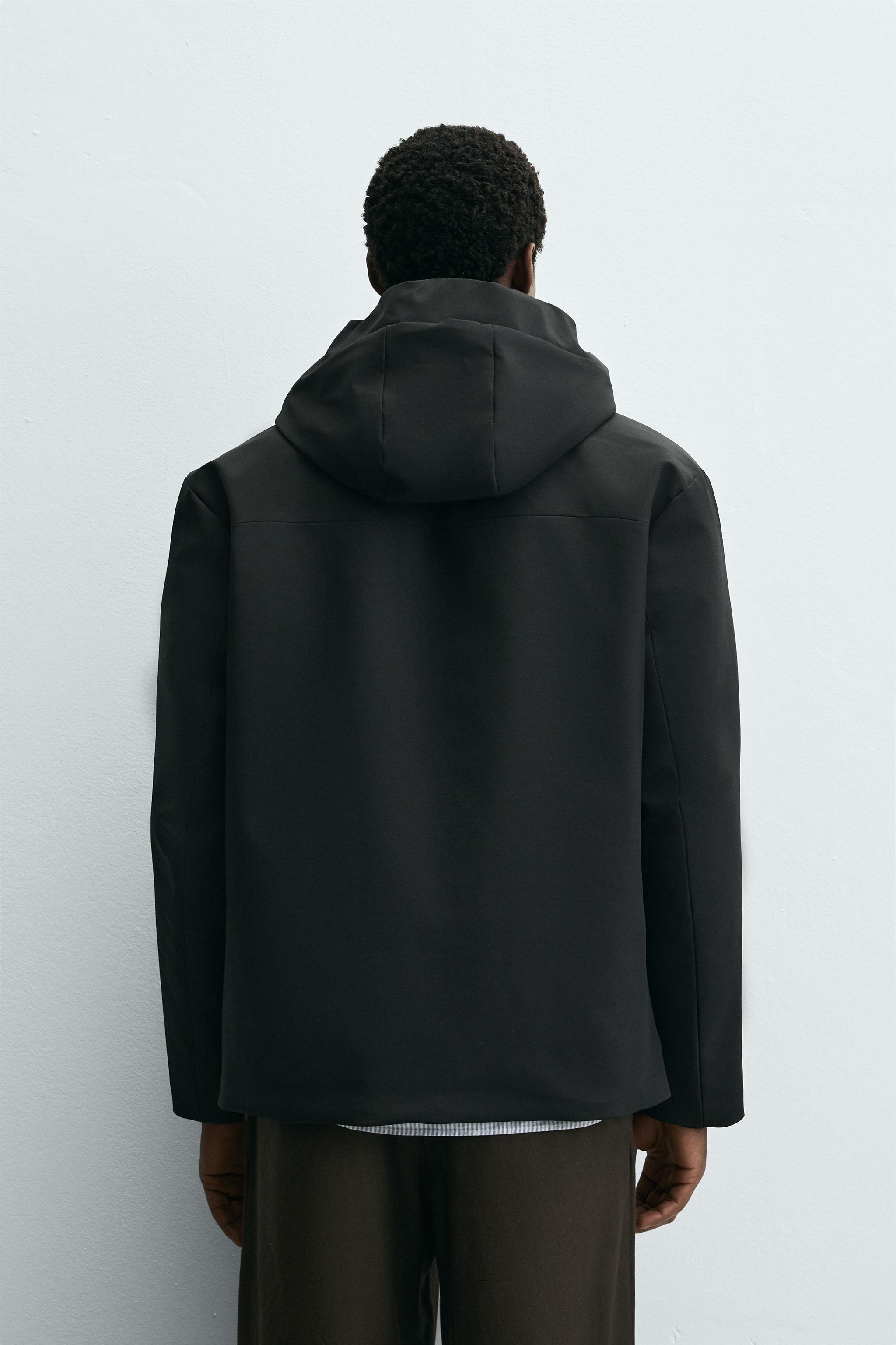 HOODED TECHNICAL JACKET
