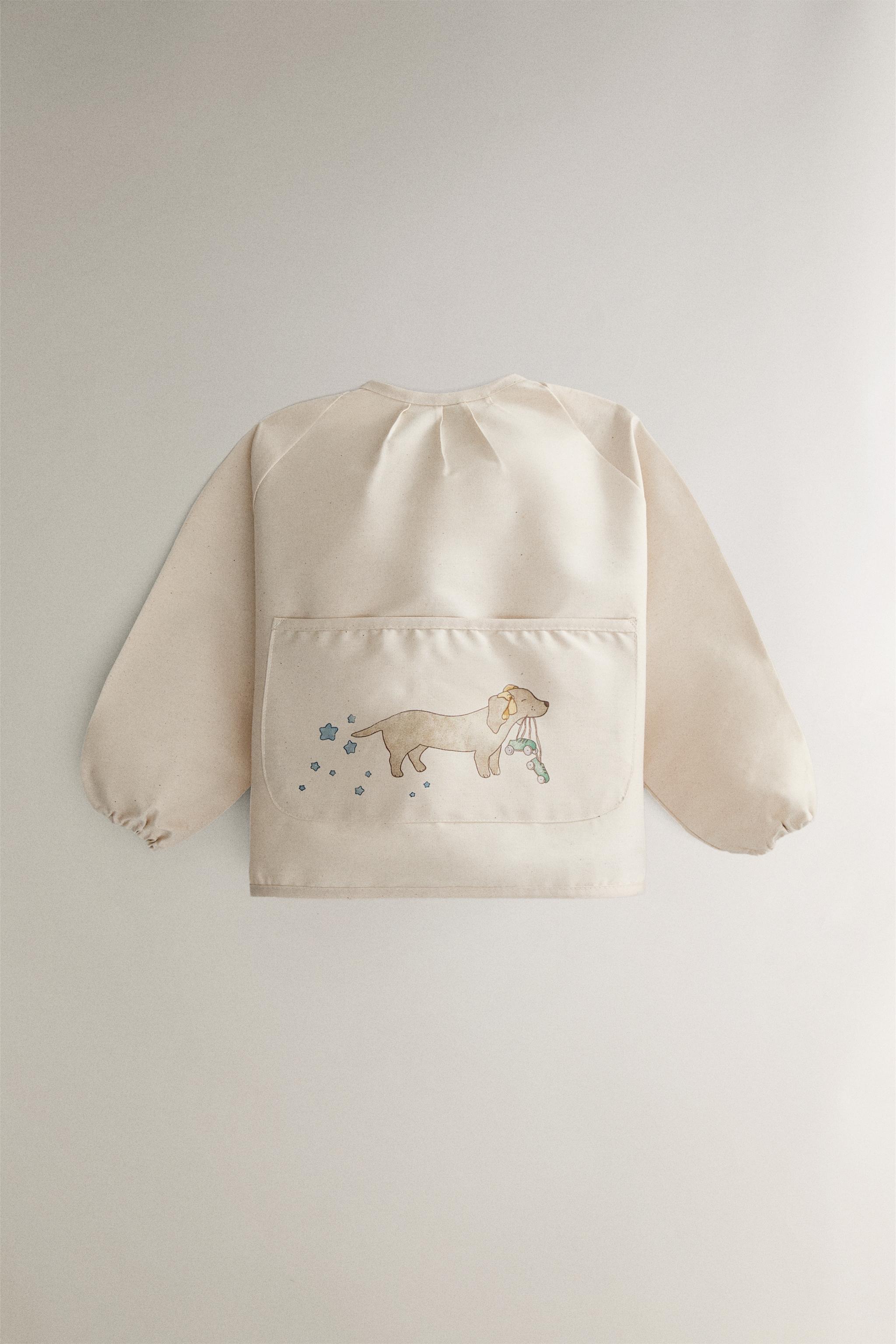 CHILDREN'S SKATING DOG BIB WITH SLEEVES