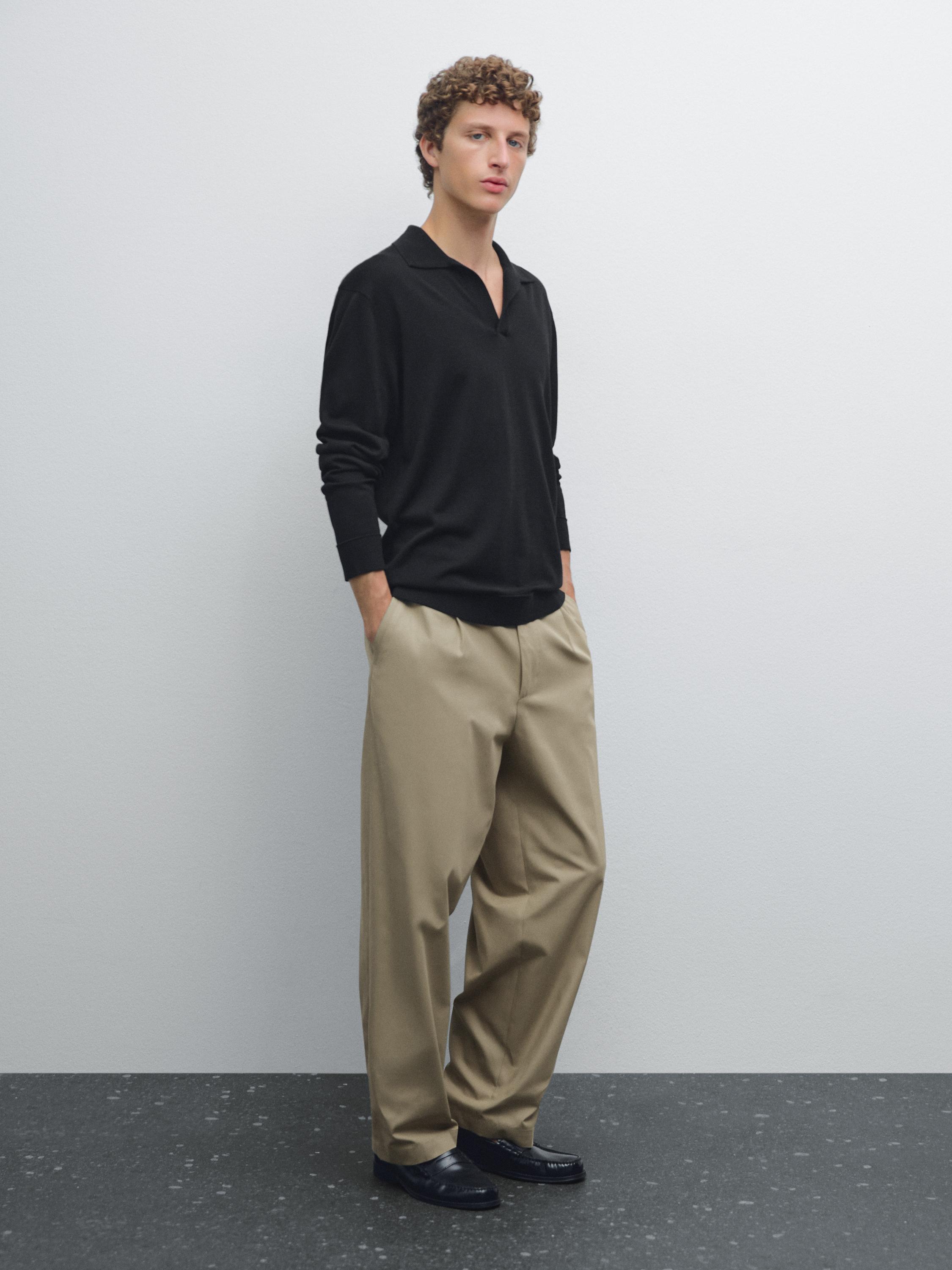 Knit sweater with a polo collar