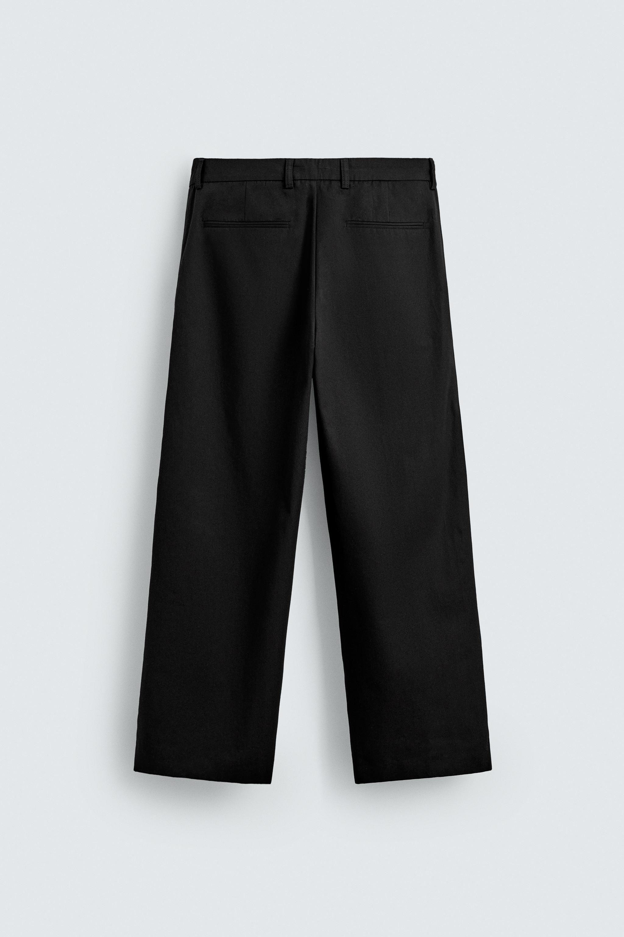 PLEATED WIDE FIT PANTS