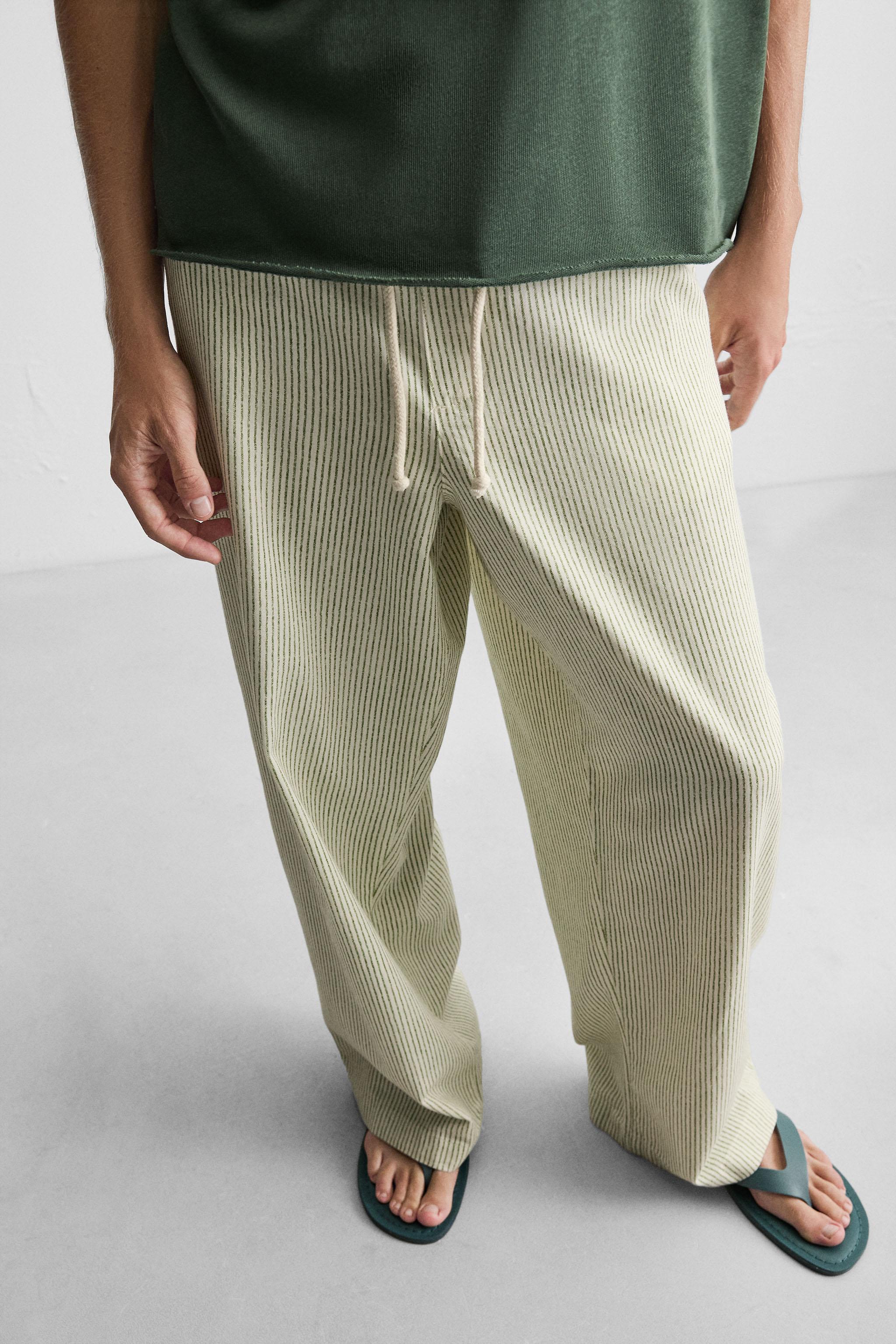 STRIPED BAGGY FIT PANTS